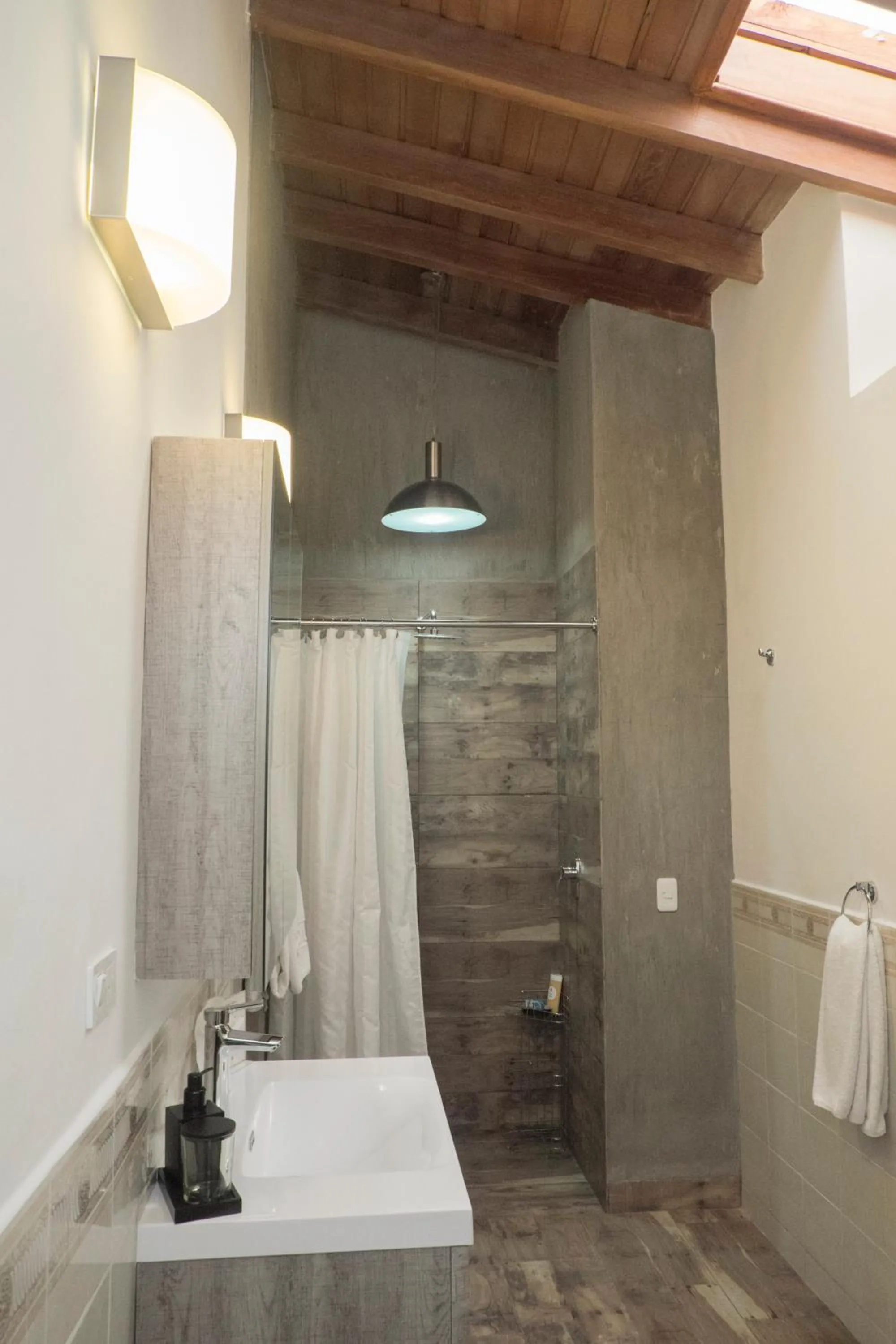 Bathroom in La Coupole Hotel