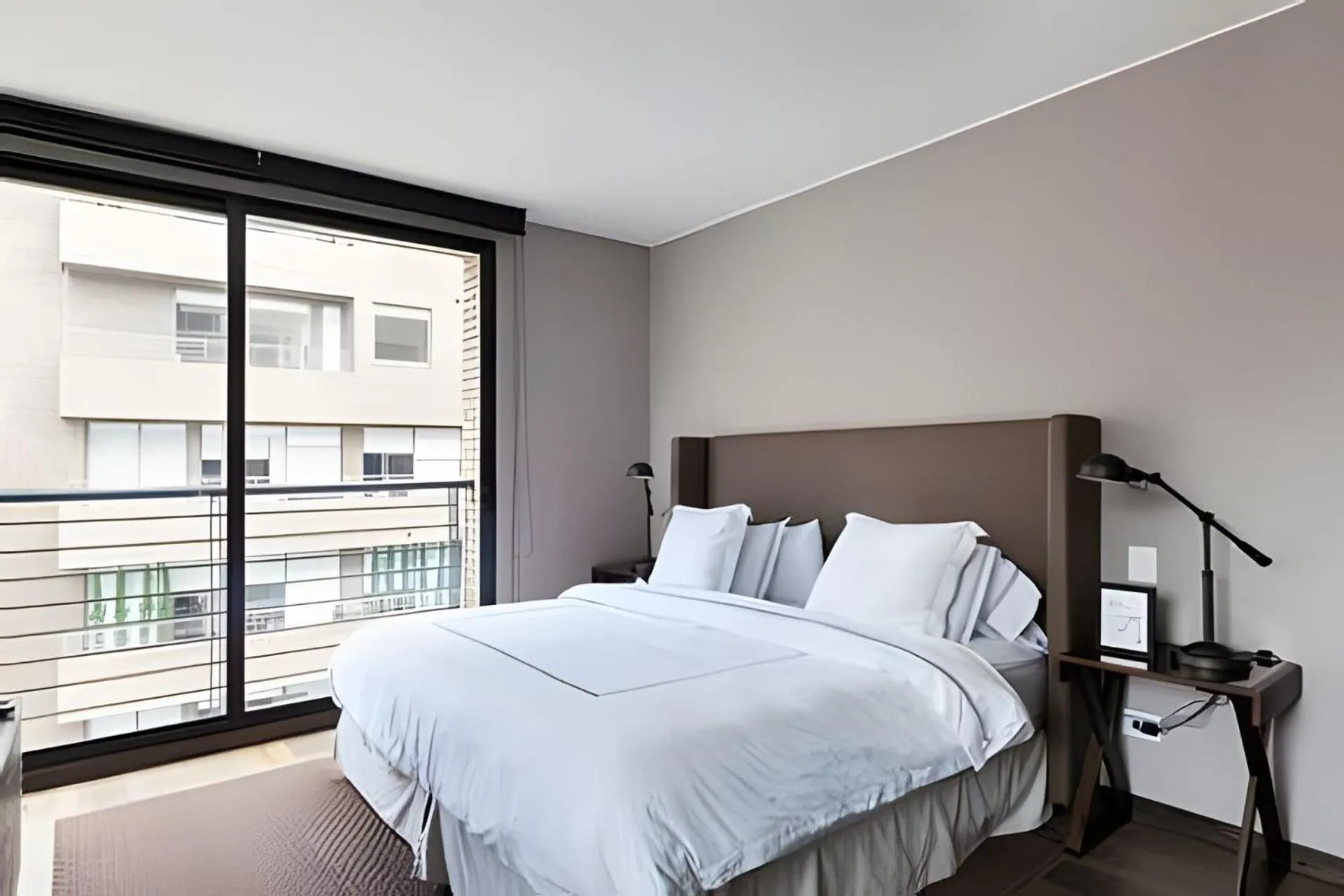 Bed in Attik Luxury Apts