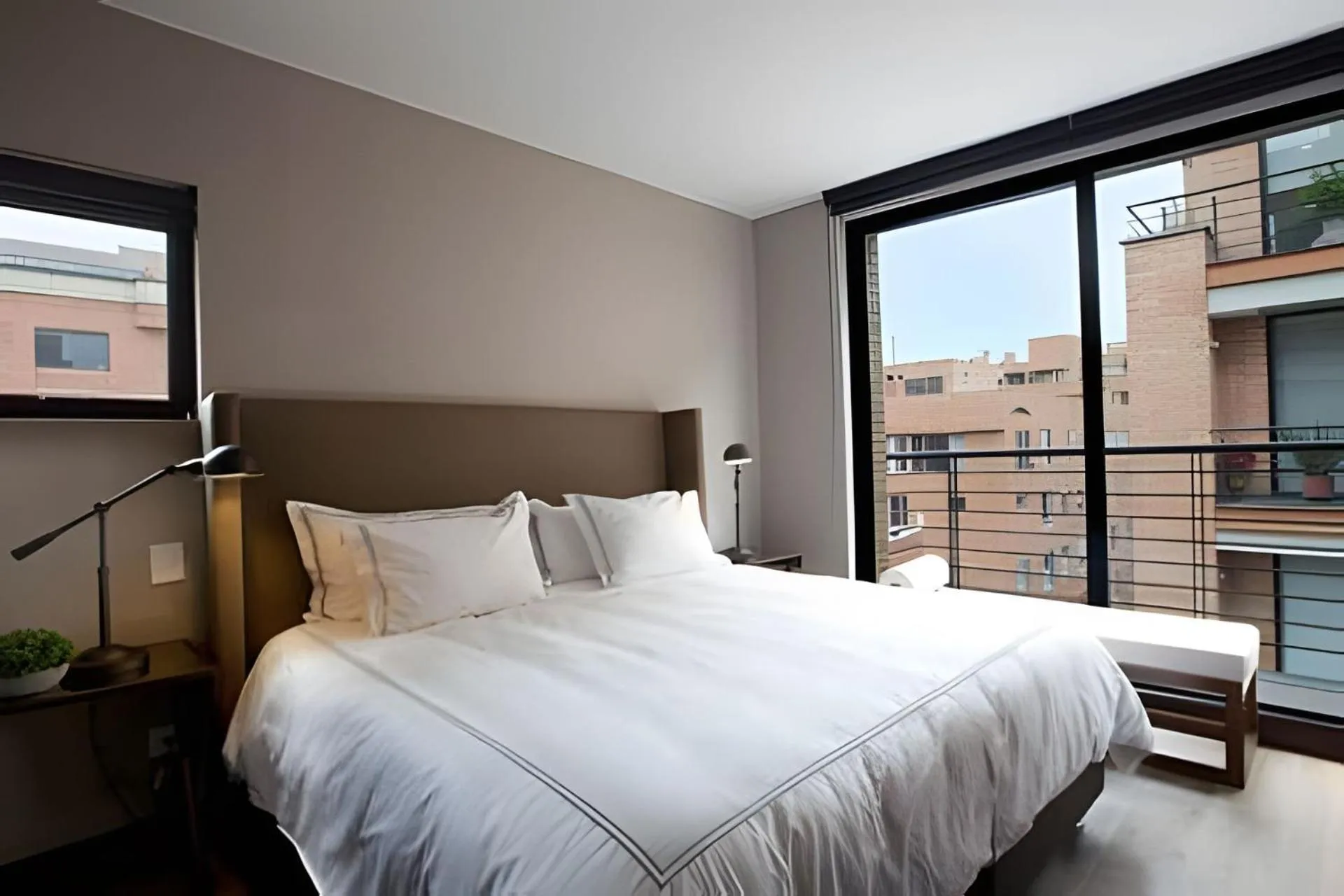 Bed in Attik Luxury Apts