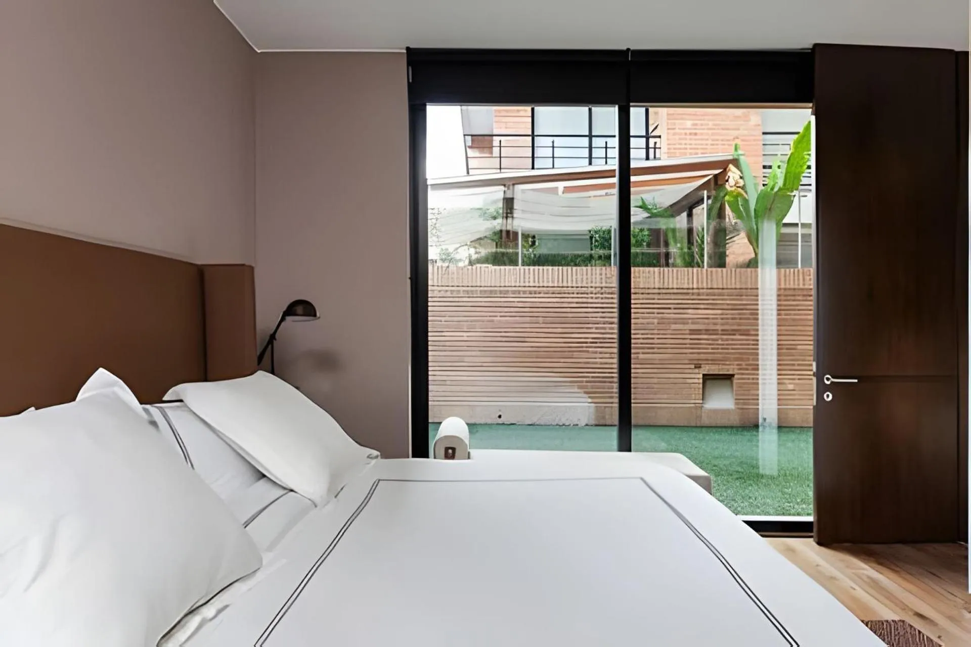 Bed in Attik Luxury Apts