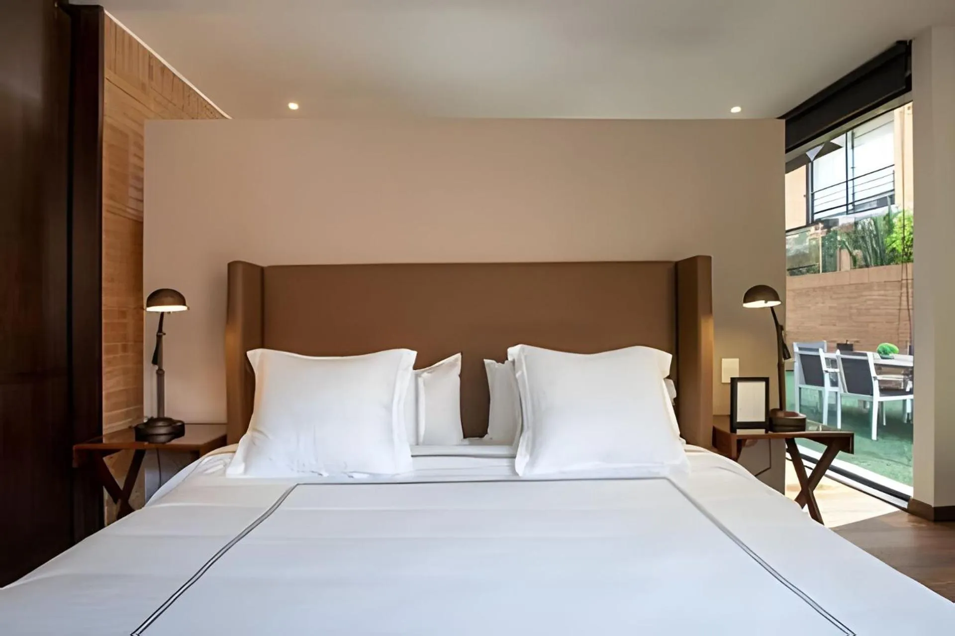 Bed in Attik Luxury Apts