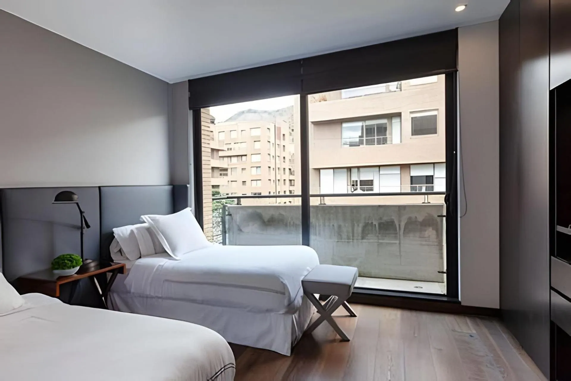 Bed in Attik Luxury Apts