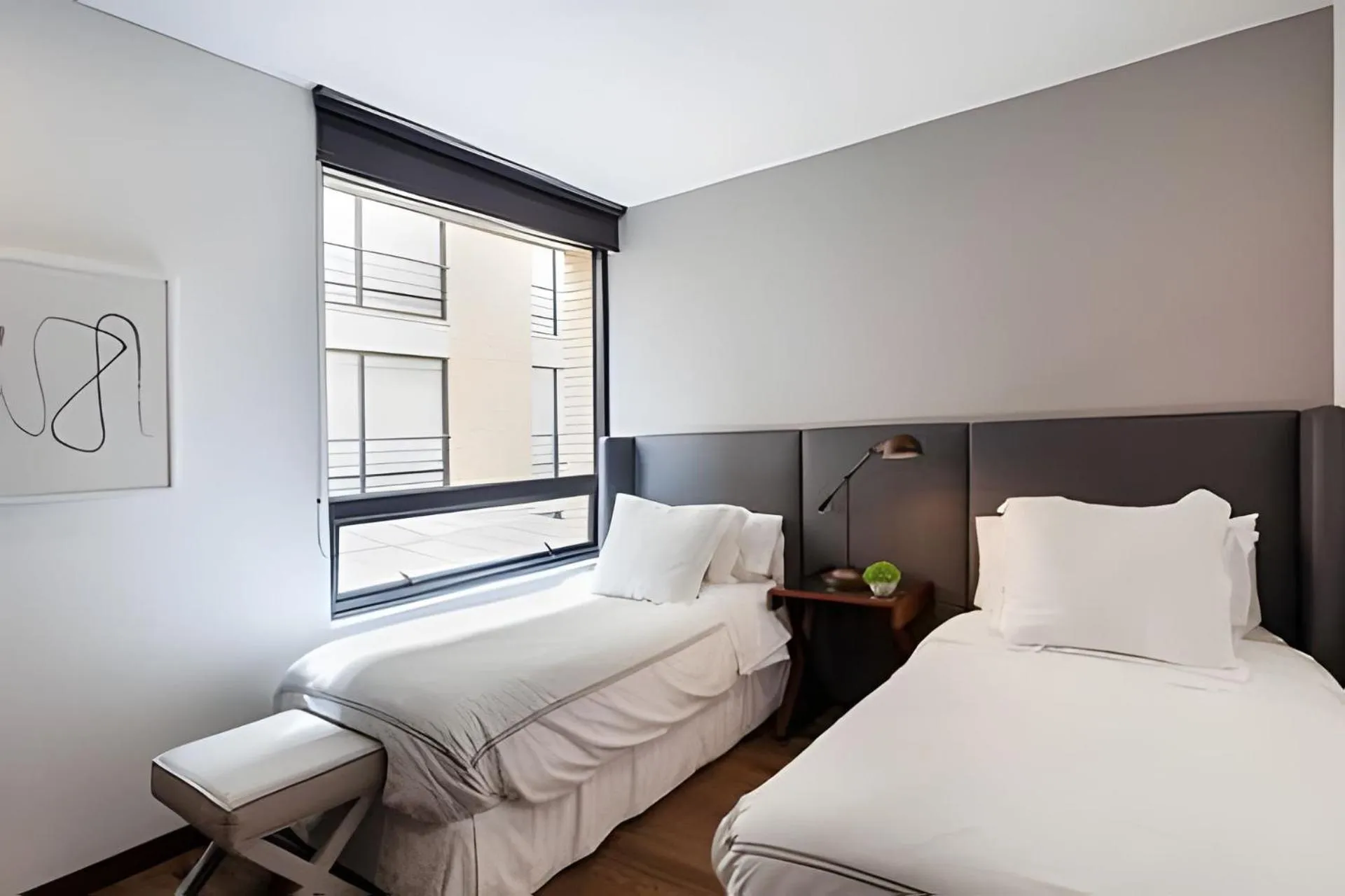 Bed in Attik Luxury Apts