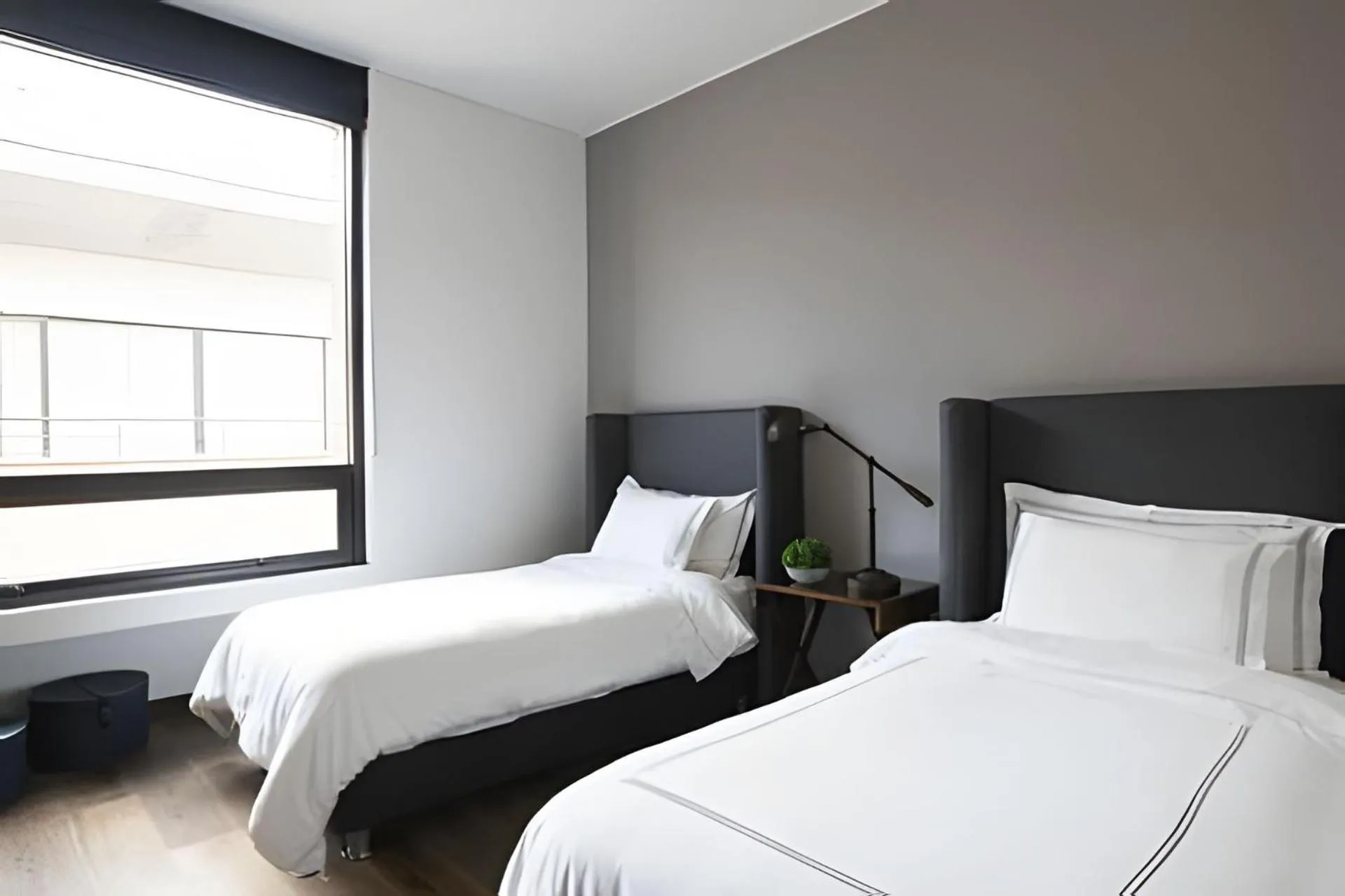 Bed in Attik Luxury Apts