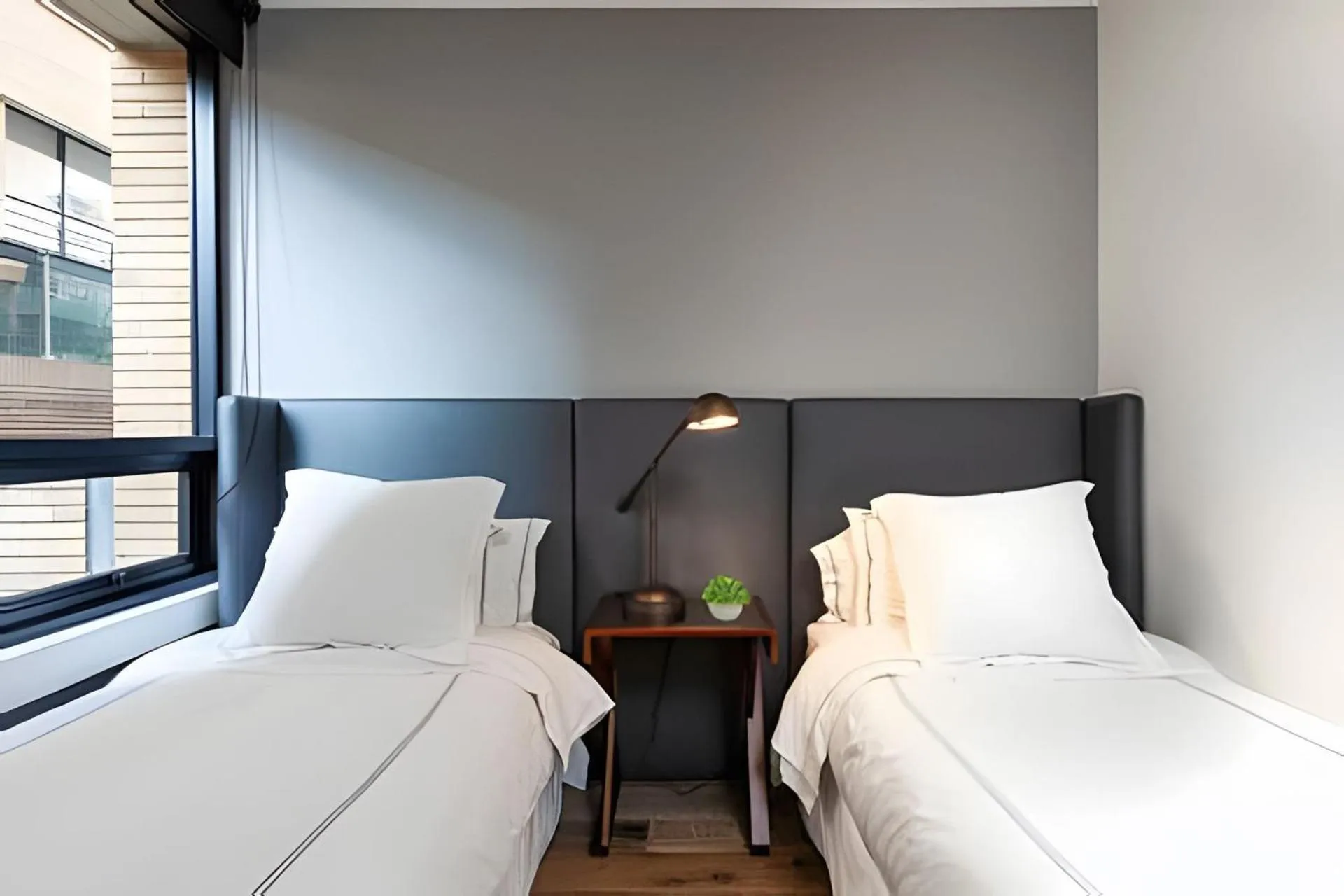 Bed in Attik Luxury Apts