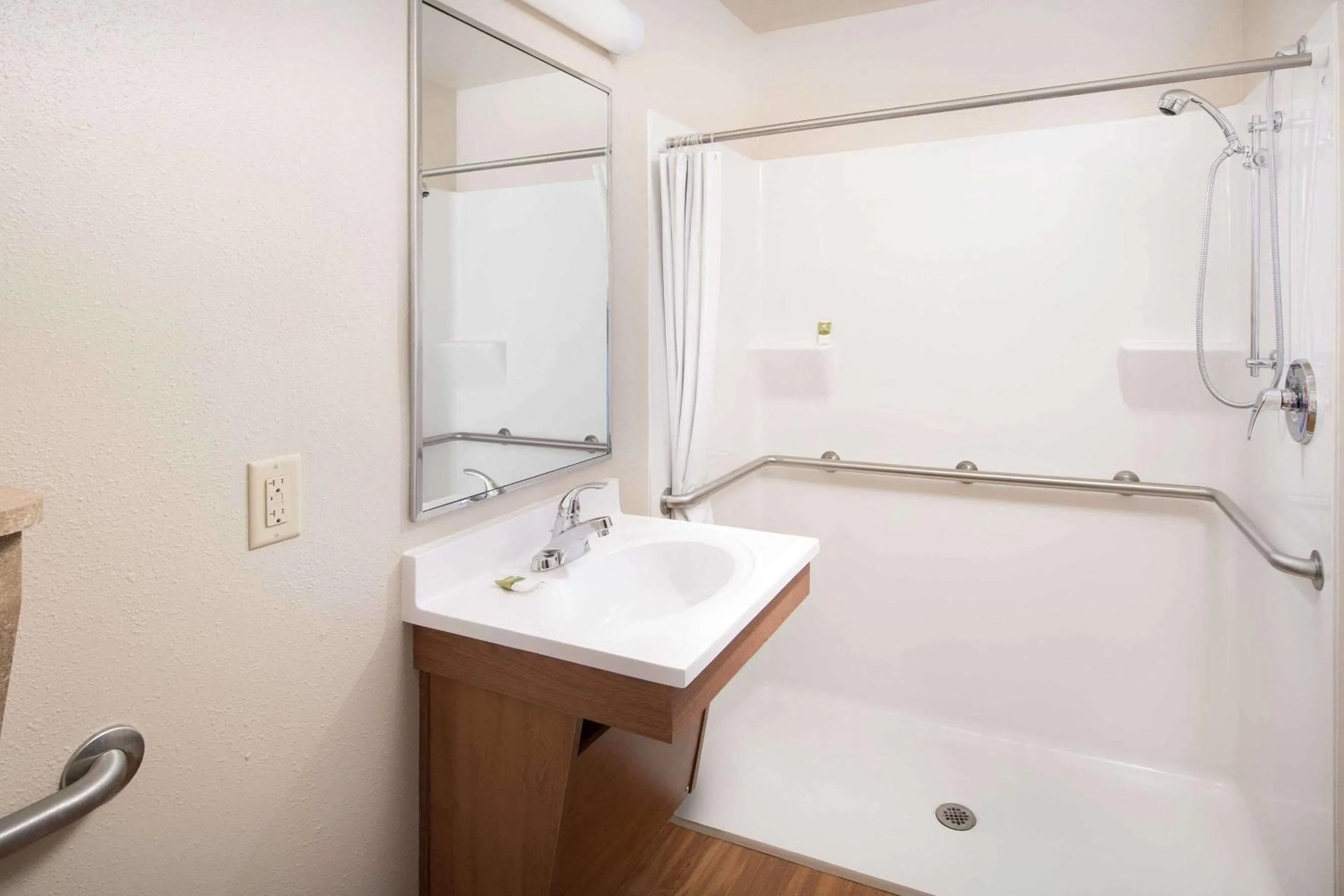 Bathroom in WoodSpring Suites Columbus NE I-270 Airport