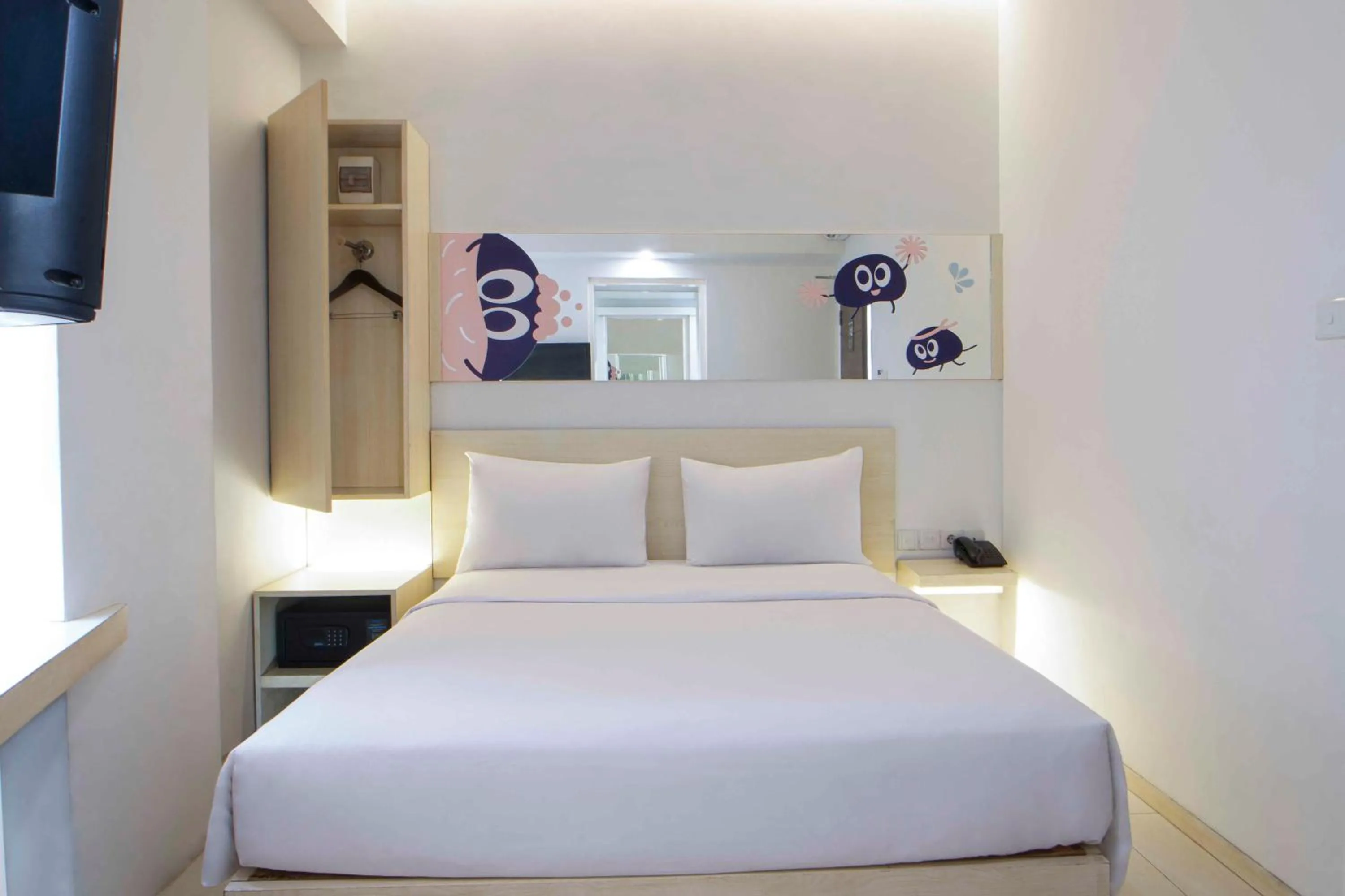 Bed in Cleo Hotel Tunjungan