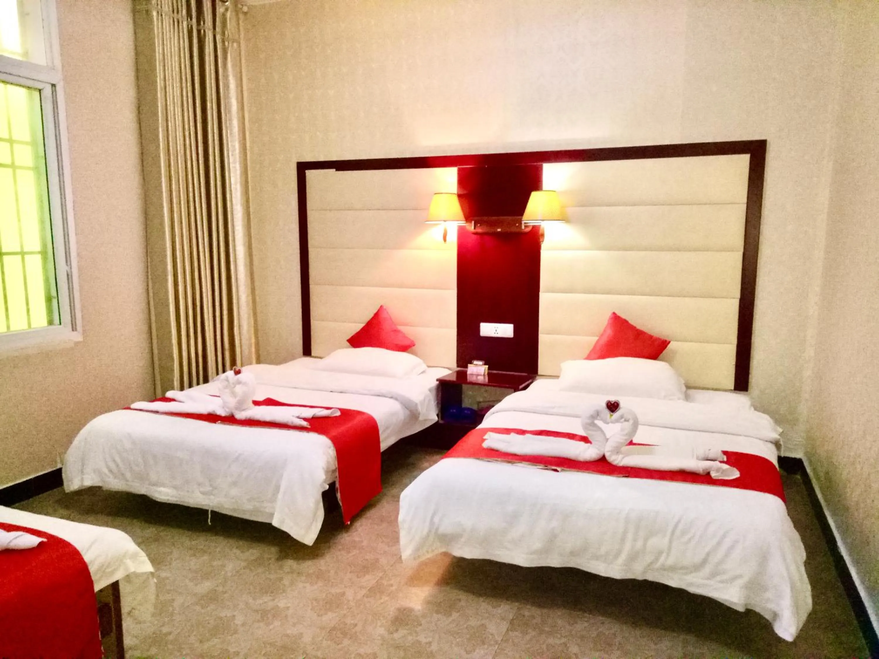 bunk bed, Bed in XiShuangBanNa International Aerial Garden South of Mekong River Business Hotel 傣江南商务酒店