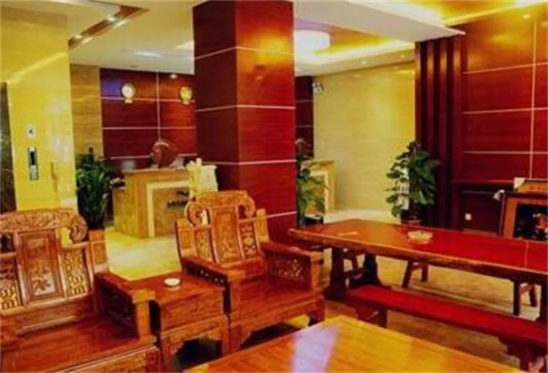 Living room in XiShuangBanNa International Aerial Garden South of Mekong River Business Hotel 傣江南商务酒店