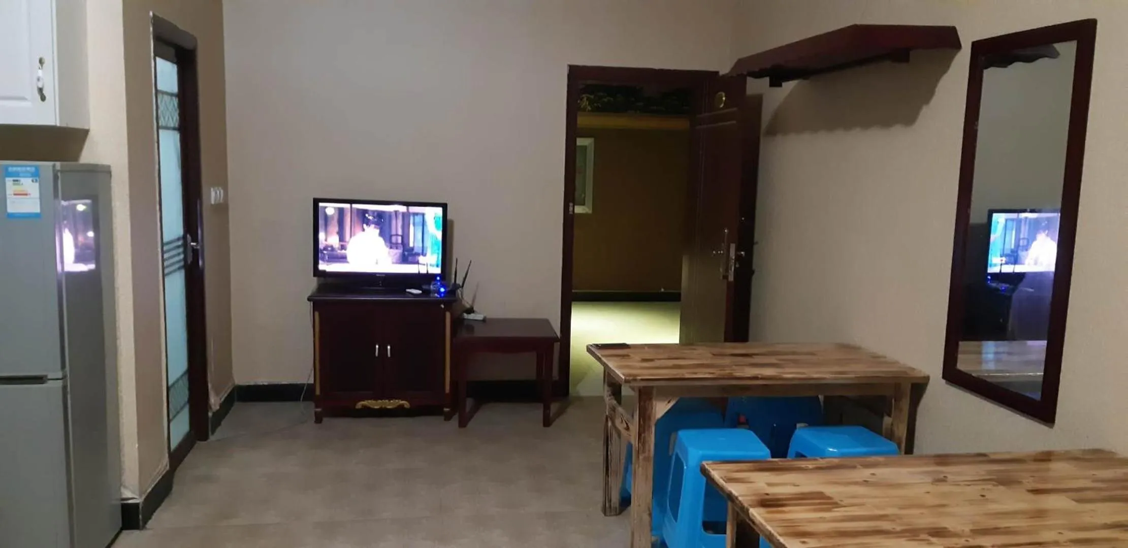 Communal lounge/ TV room in XiShuangBanNa International Aerial Garden South of Mekong River Business Hotel 傣江南商务酒店