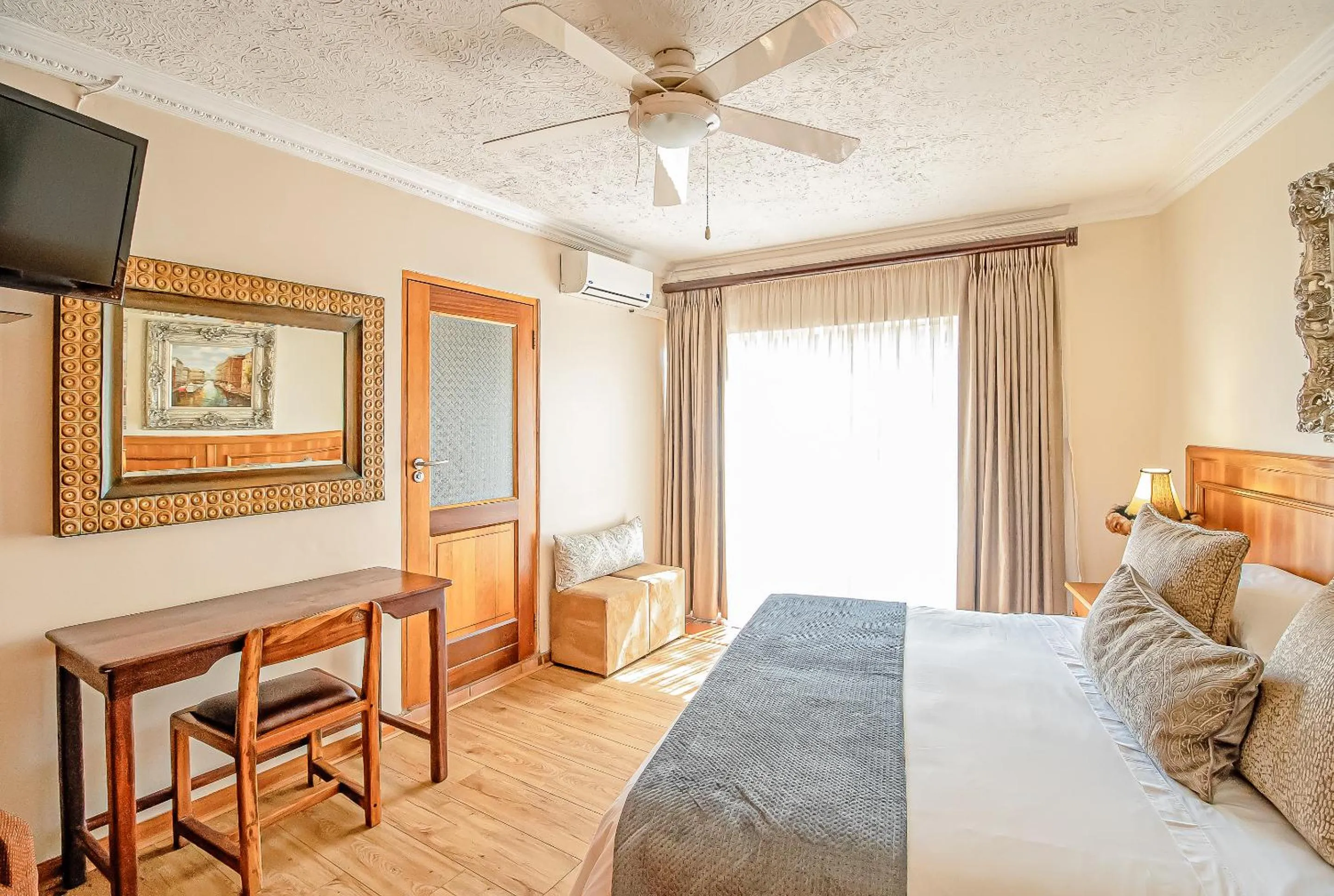 Bed in Sunward Park Guest House & Conference Center