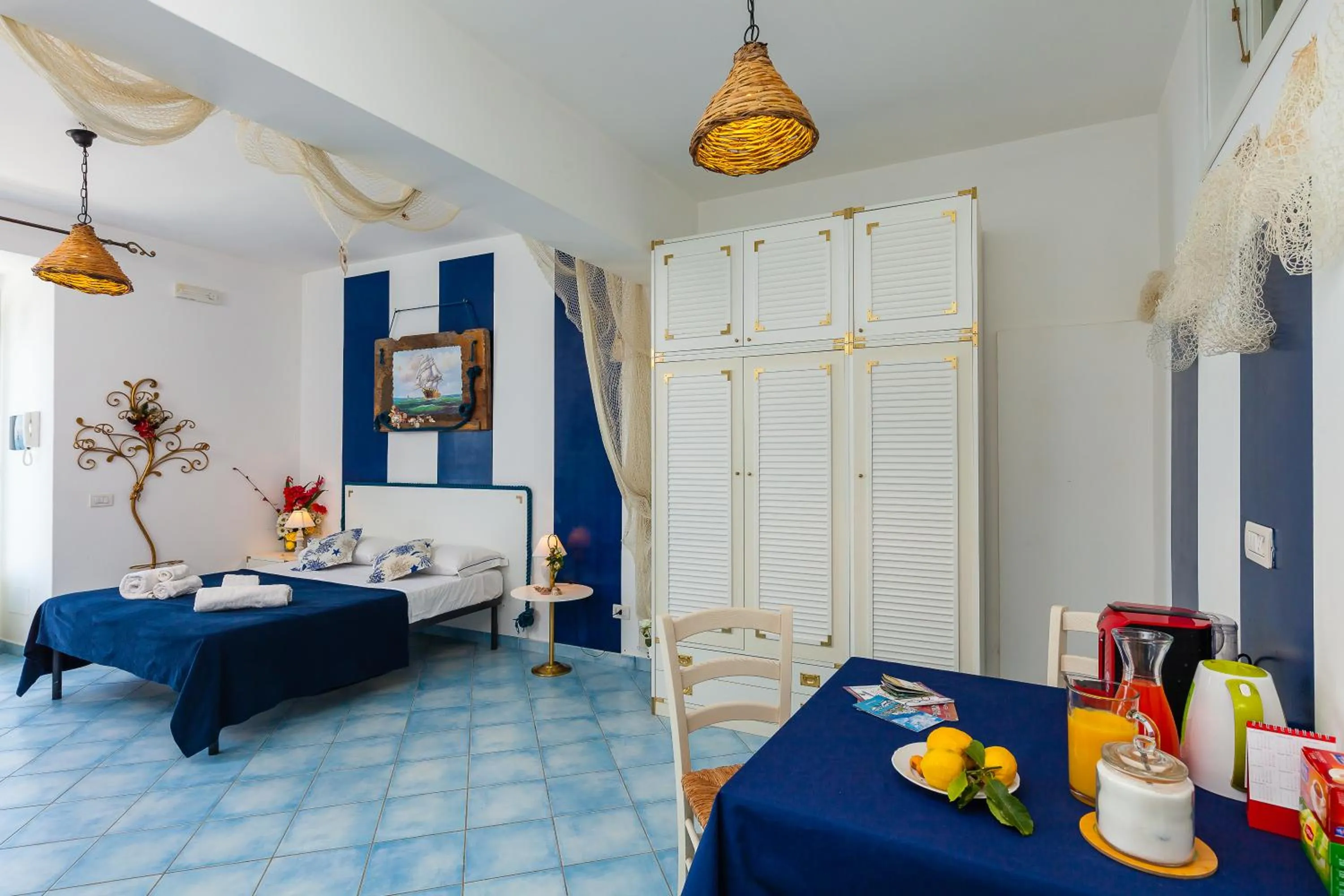 Living room, Bed in Residenza Gennaro