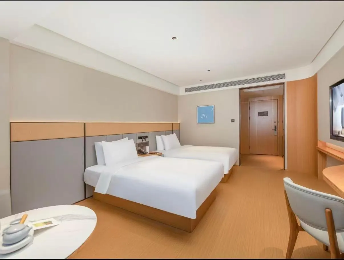 Bed in JI Hotel Suzhou Guanqian Street Chayuanchang Metro Station