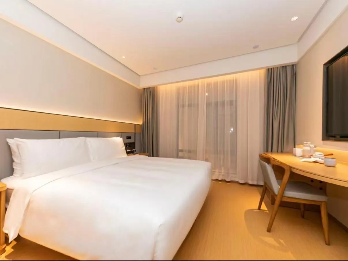 Bed in JI Hotel Suzhou Guanqian Street Chayuanchang Metro Station