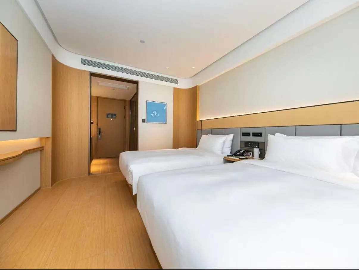 Bed in JI Hotel Suzhou Guanqian Street Chayuanchang Metro Station