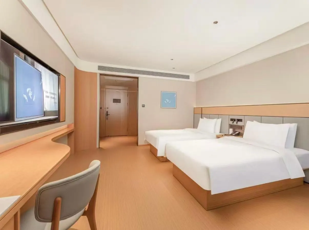 Bed in JI Hotel Suzhou Guanqian Street Chayuanchang Metro Station