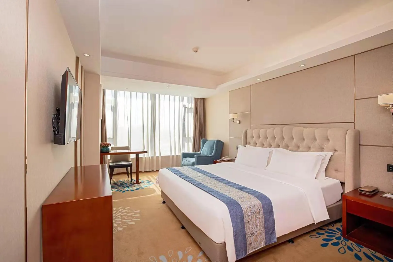Photo of the whole room, Bed in Madison Hotel Zhengzhou Erqi Square