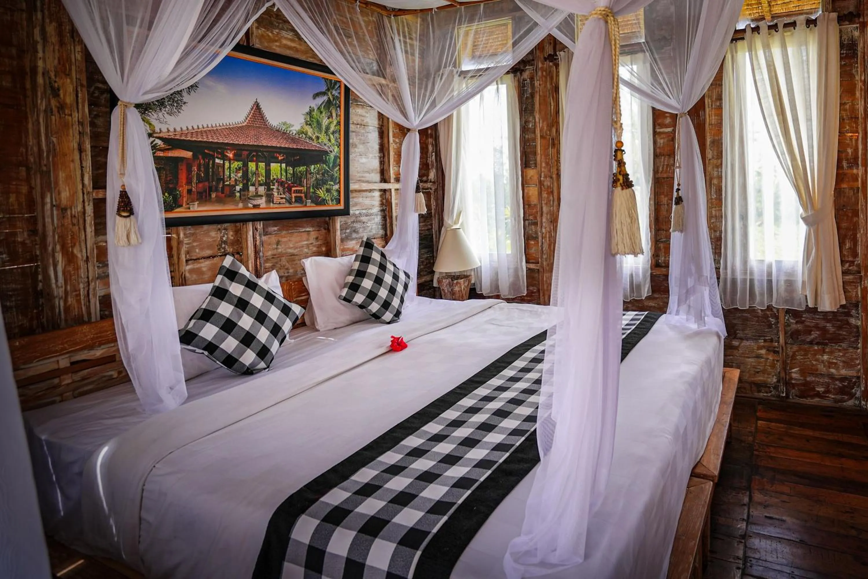 Bed in De Klumpu Bali Eco Tradi Stay