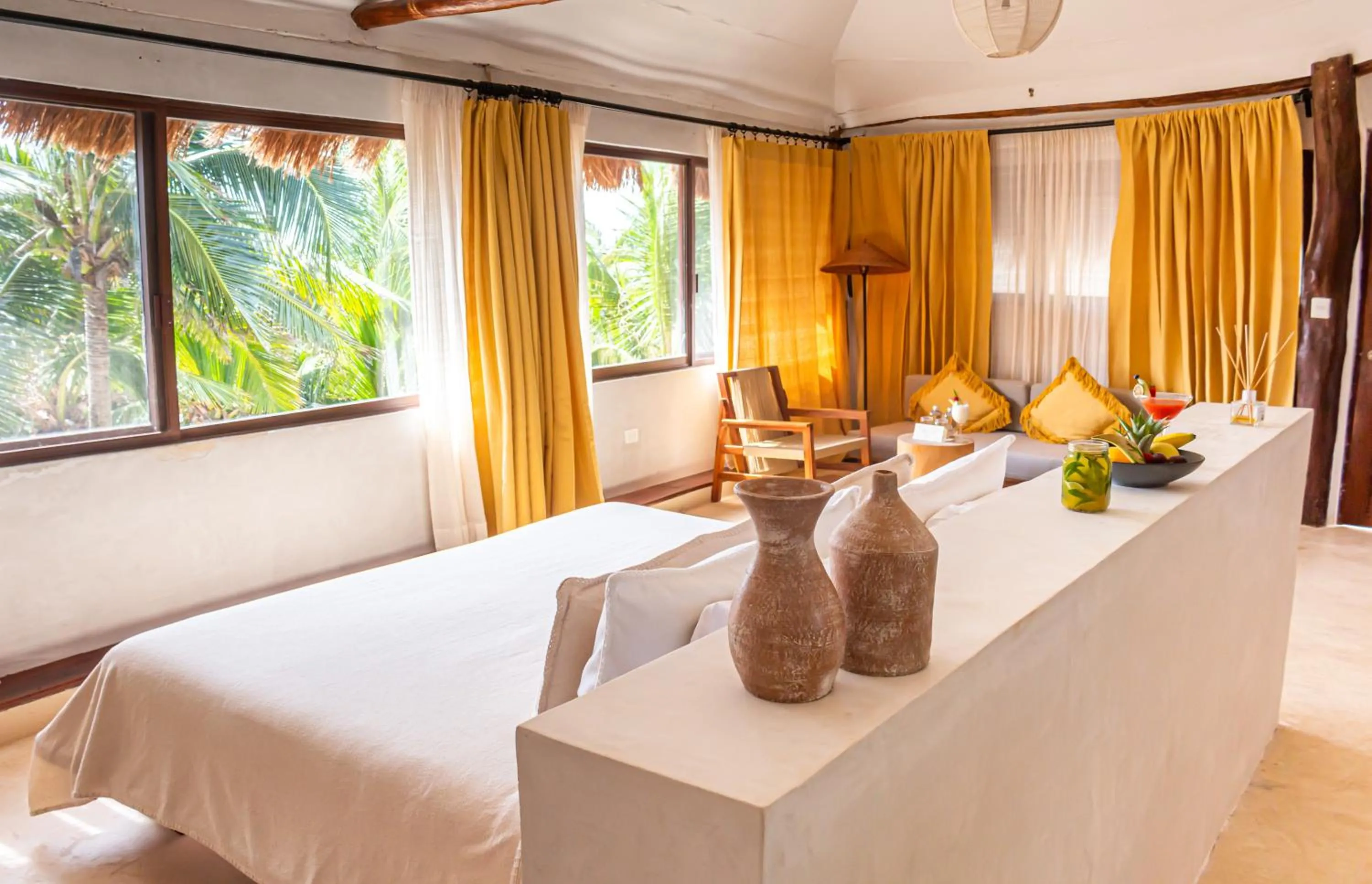 Bed in Dune Boutique Hotel located at the party zone