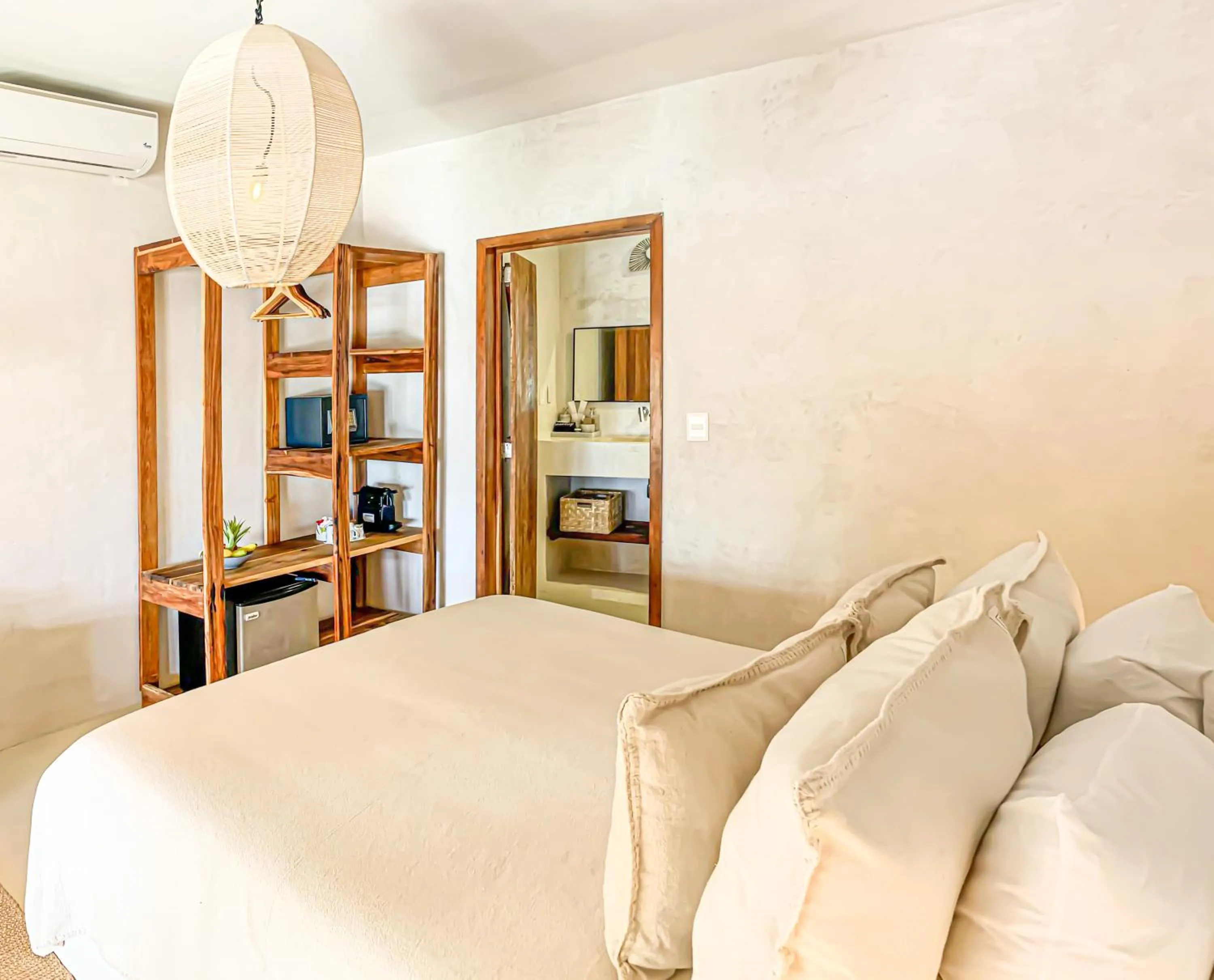 Bathroom, Bed in Dune Boutique Hotel located at the party zone