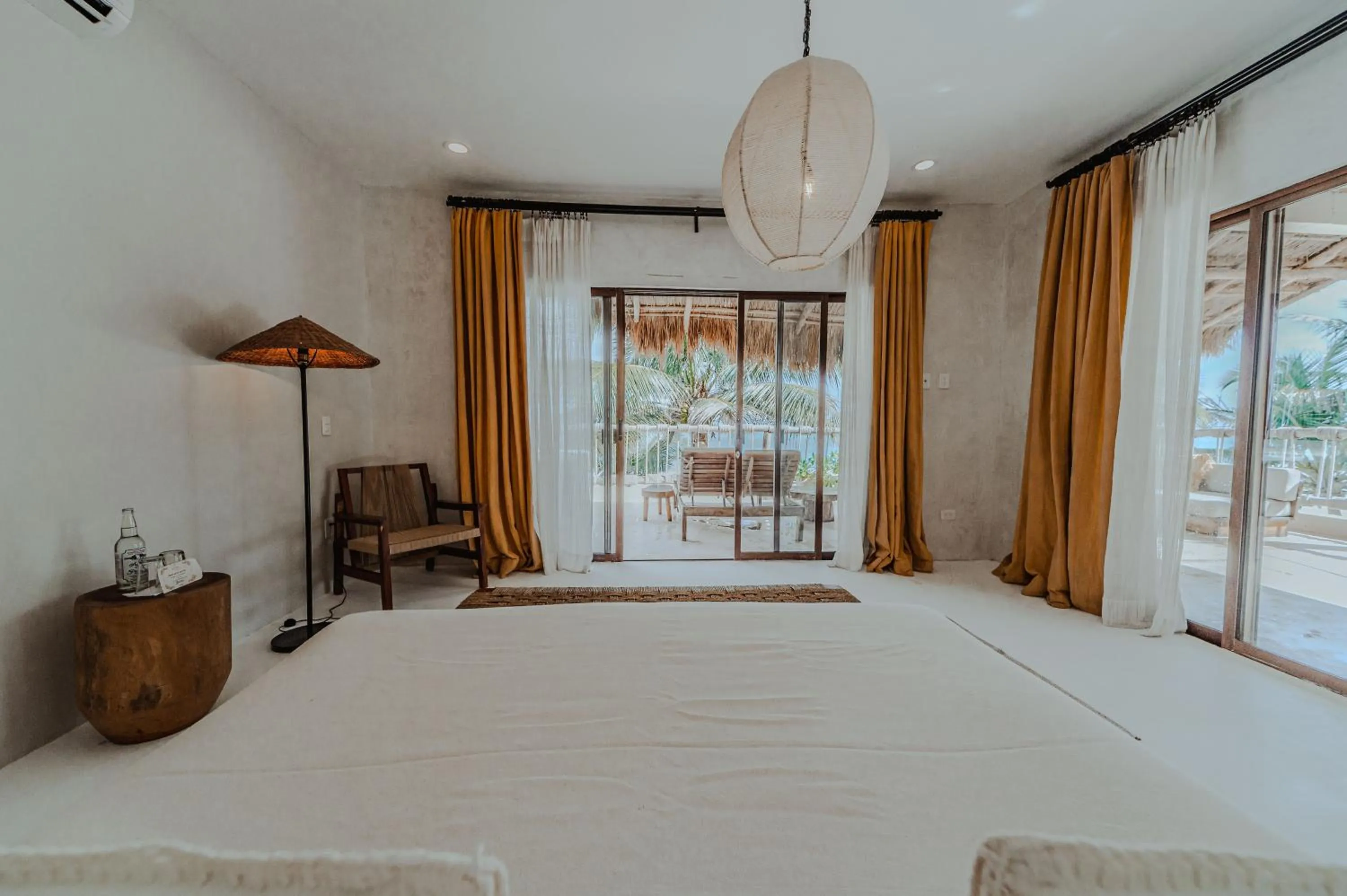 Bed in Dune Boutique Hotel located at the party zone