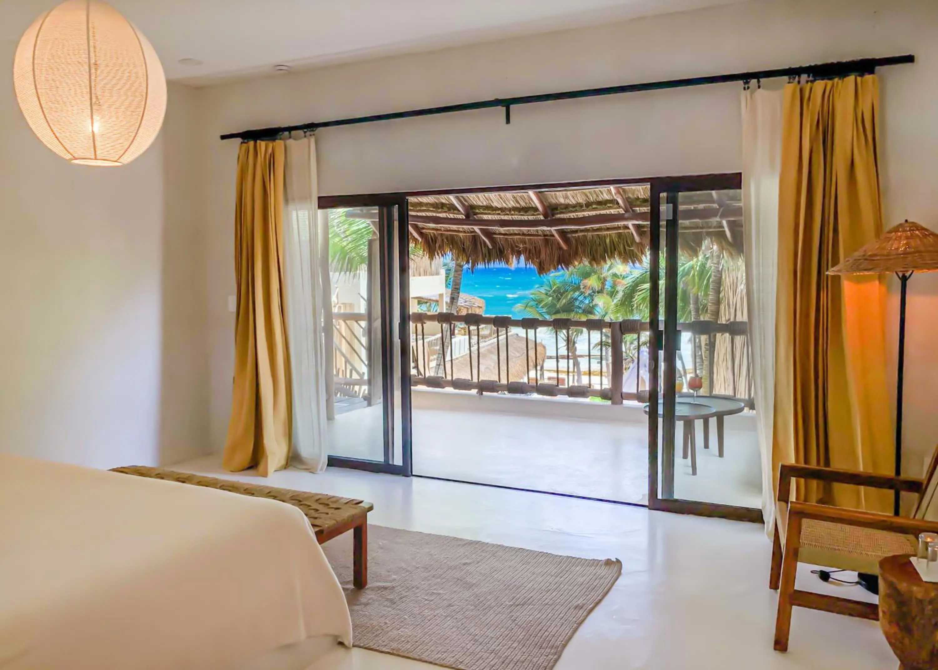 Bed in Dune Boutique Hotel located at the party zone