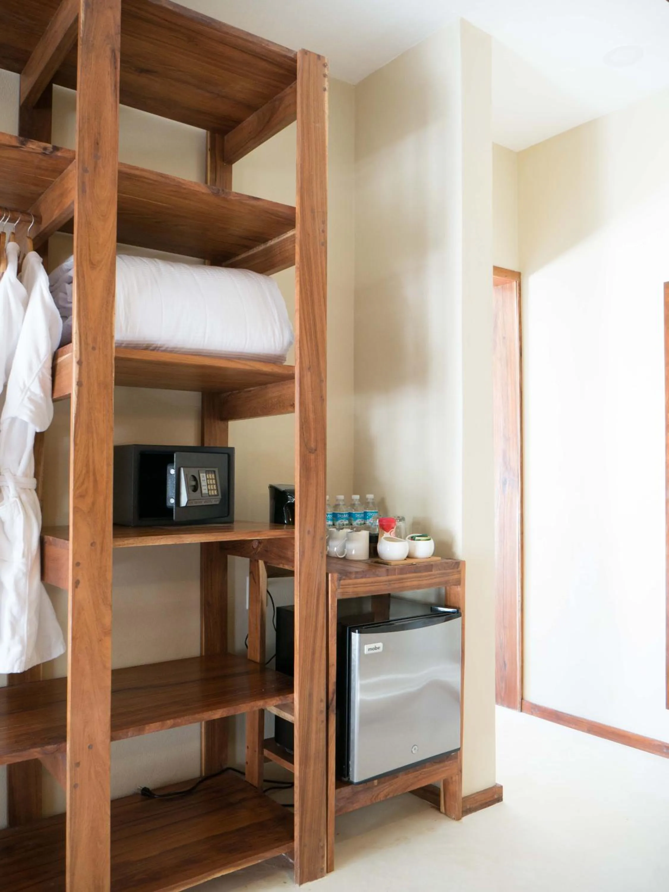 Coffee/tea facilities, Bed in Dune Boutique Hotel located at the party zone