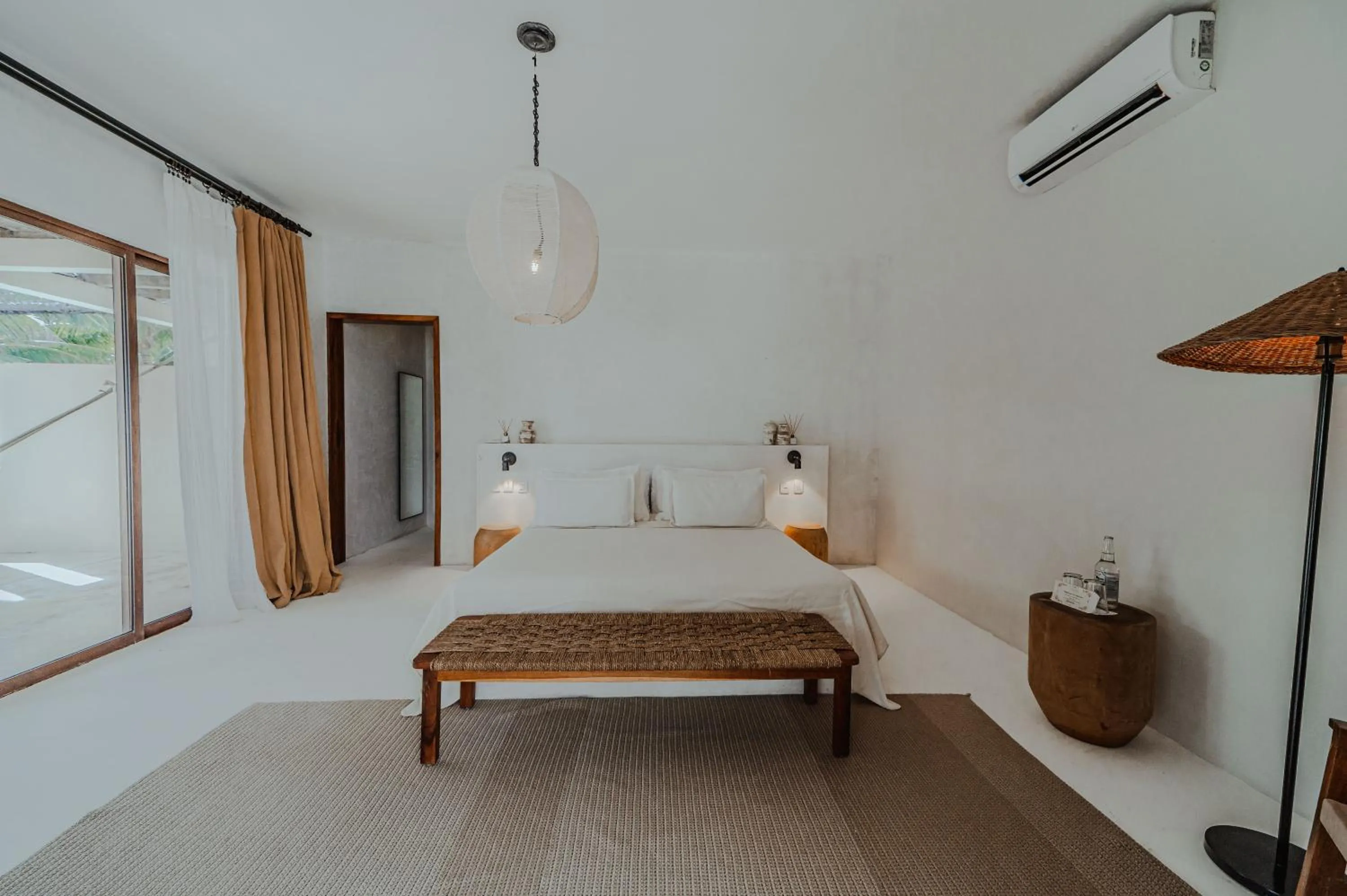 Bed in Dune Boutique Hotel located at the party zone