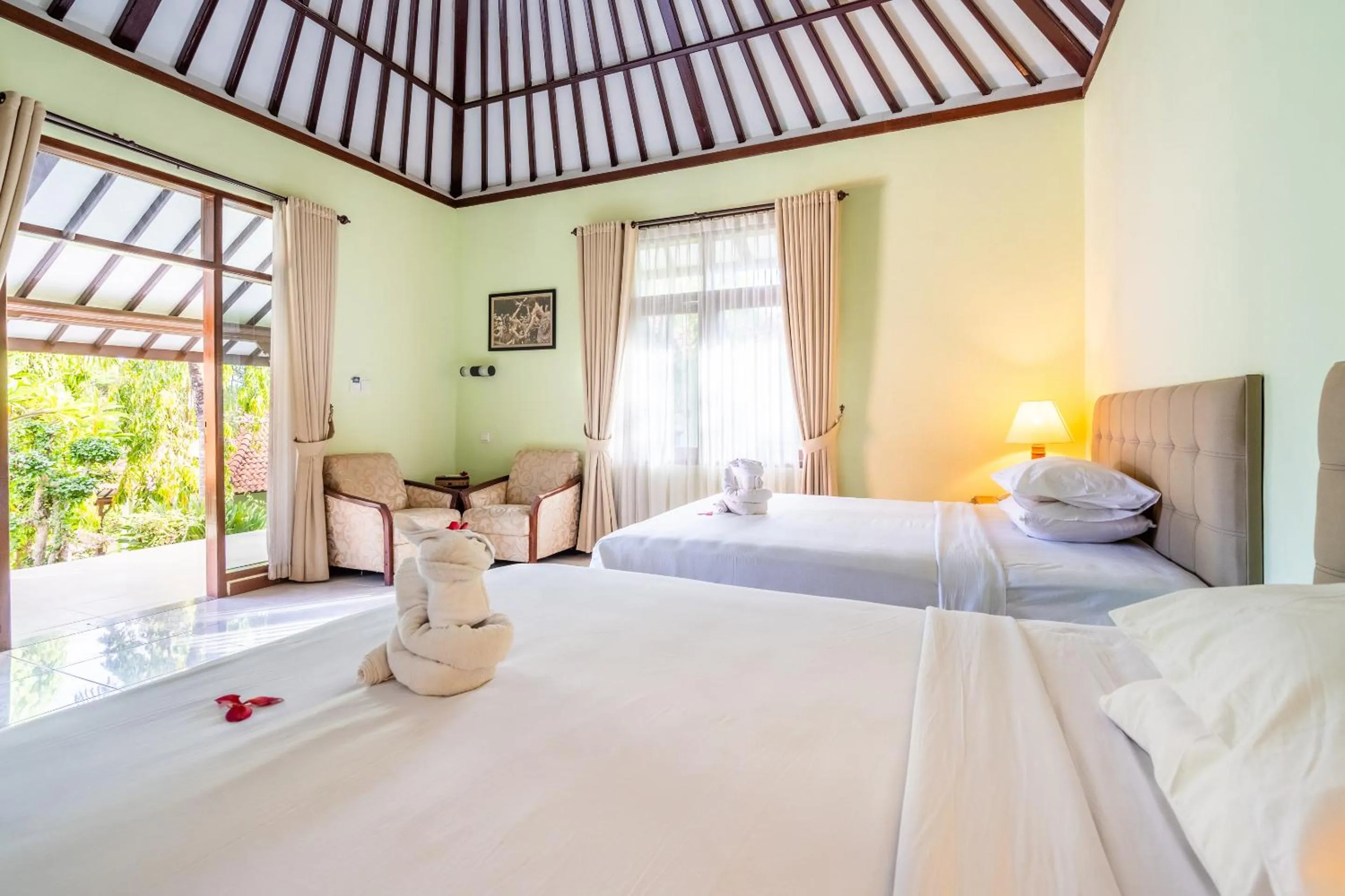 Bed in Taman Surgawi Resort & Spa
