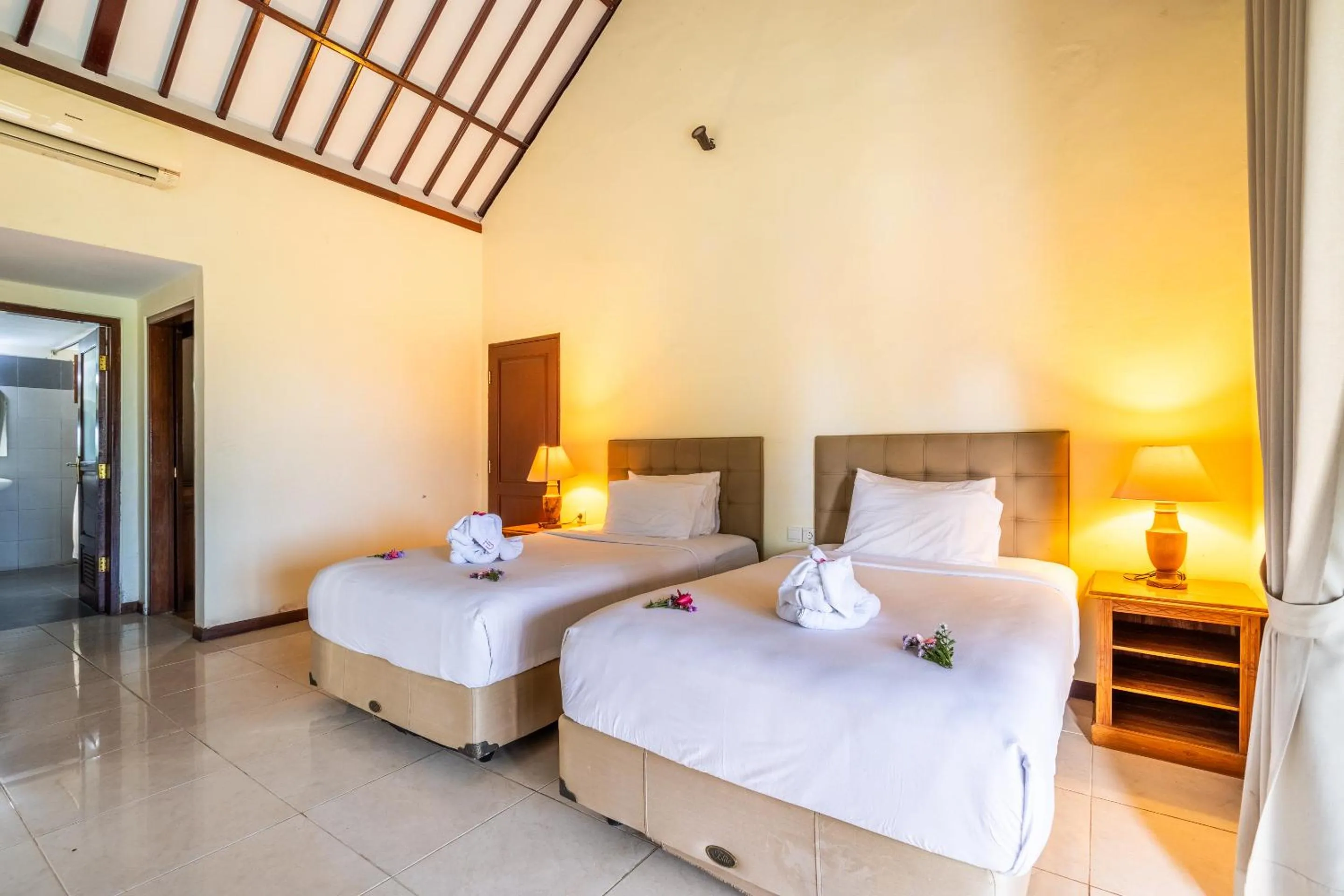 Bed in Taman Surgawi Resort & Spa