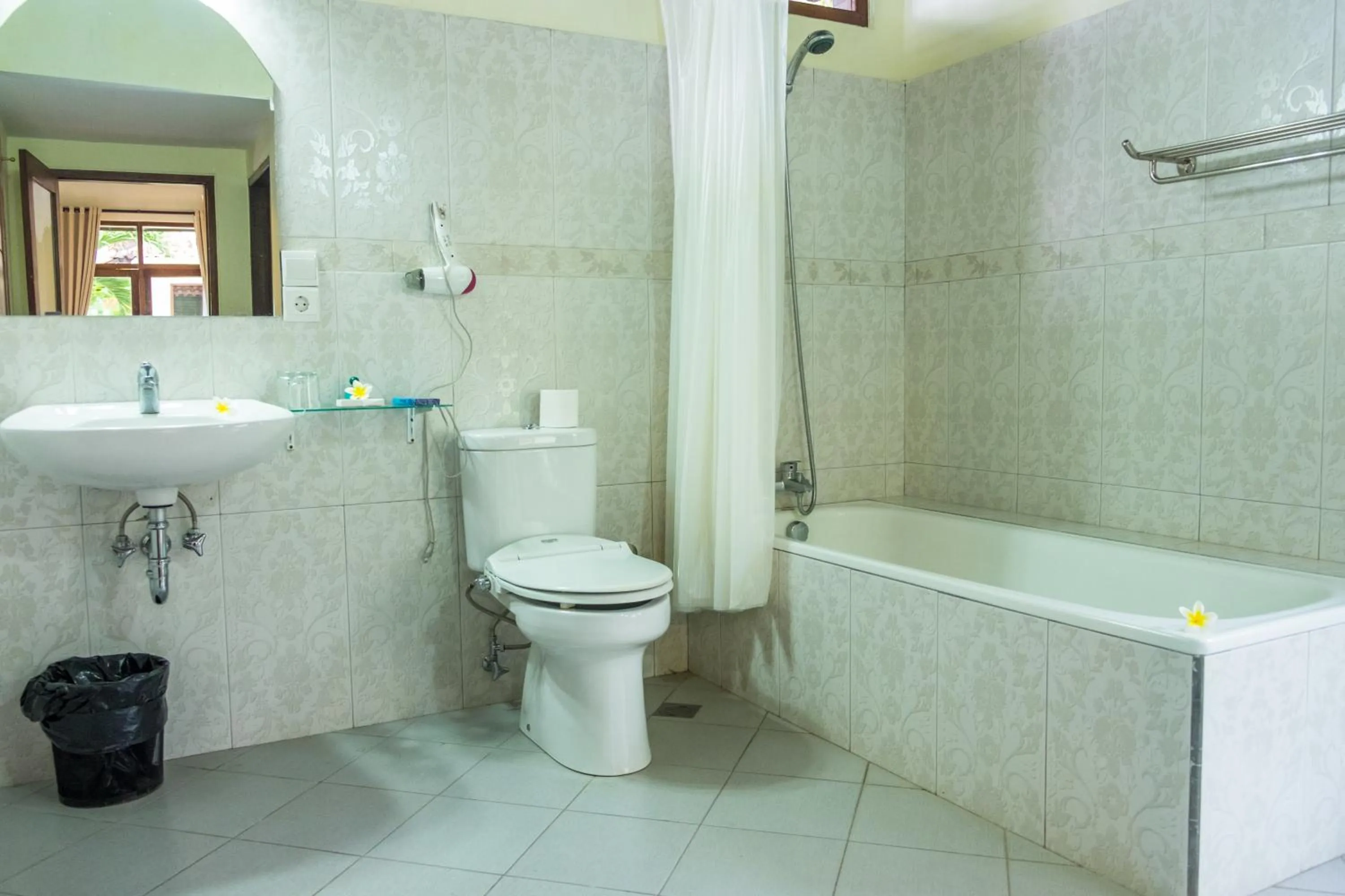 Shower in Taman Surgawi Resort & Spa