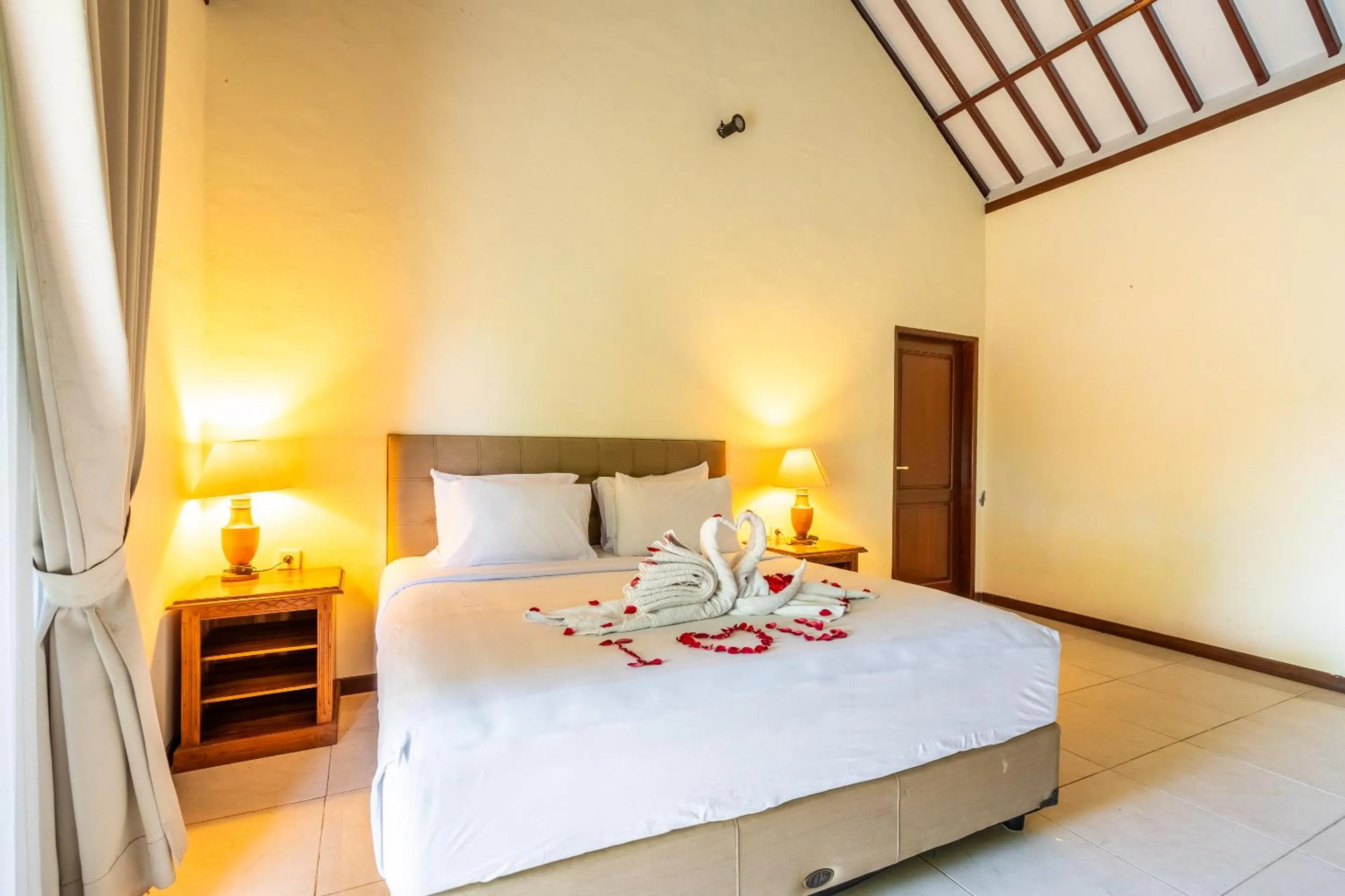 Bed in Taman Surgawi Resort & Spa