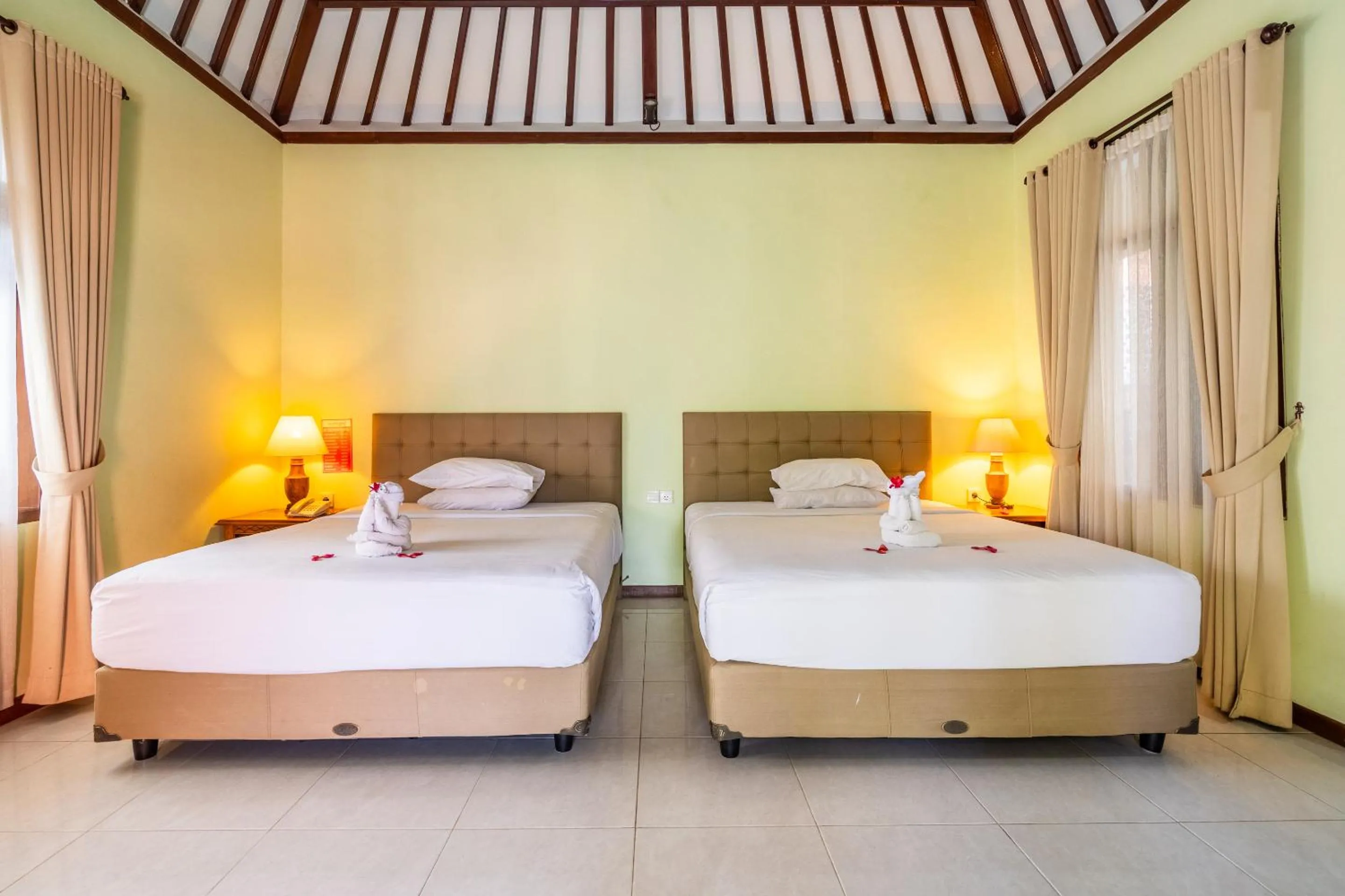 Bed in Taman Surgawi Resort & Spa