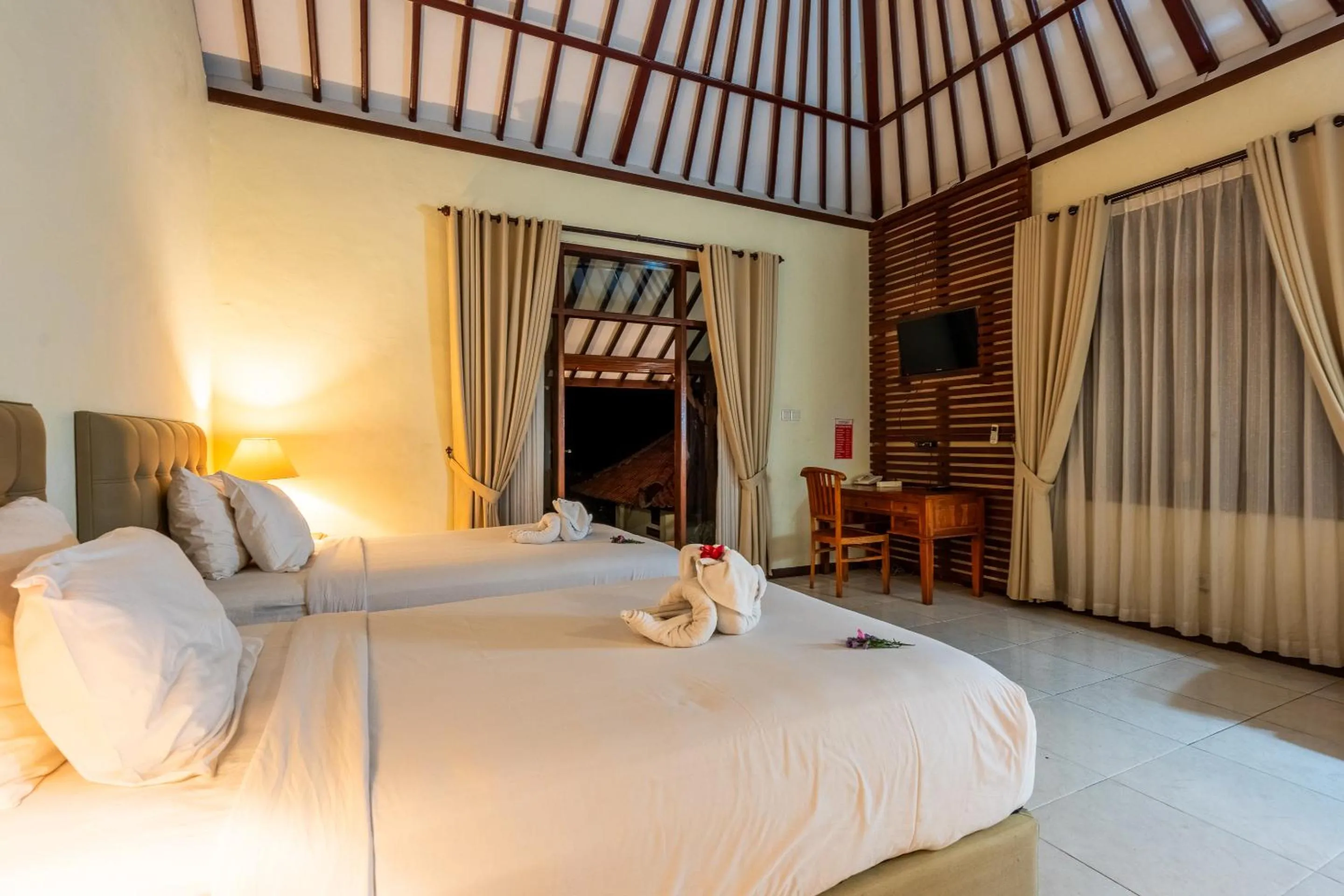 Bed in Taman Surgawi Resort & Spa