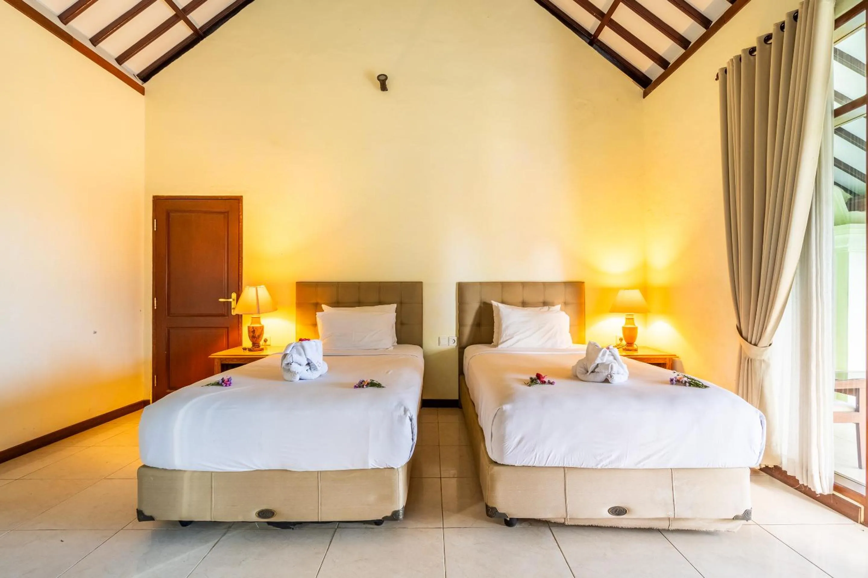 Bed in Taman Surgawi Resort & Spa