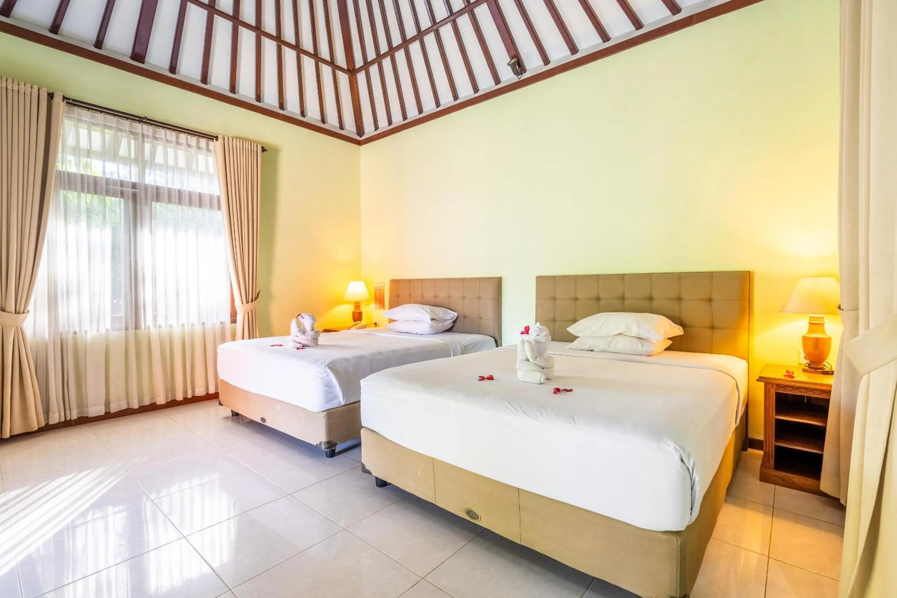 Bed in Taman Surgawi Resort & Spa