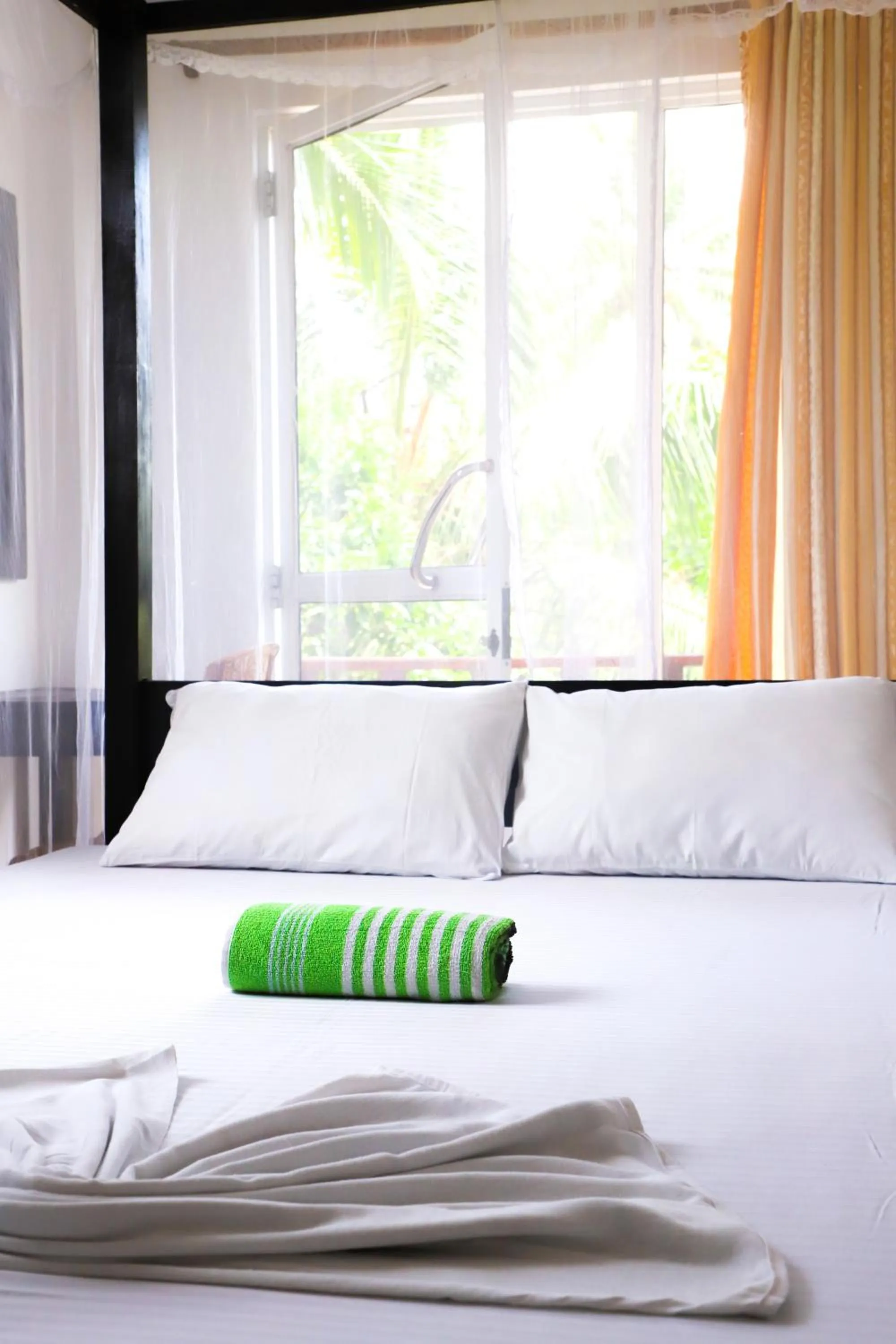 Bed in Cocoplant Surf Inn