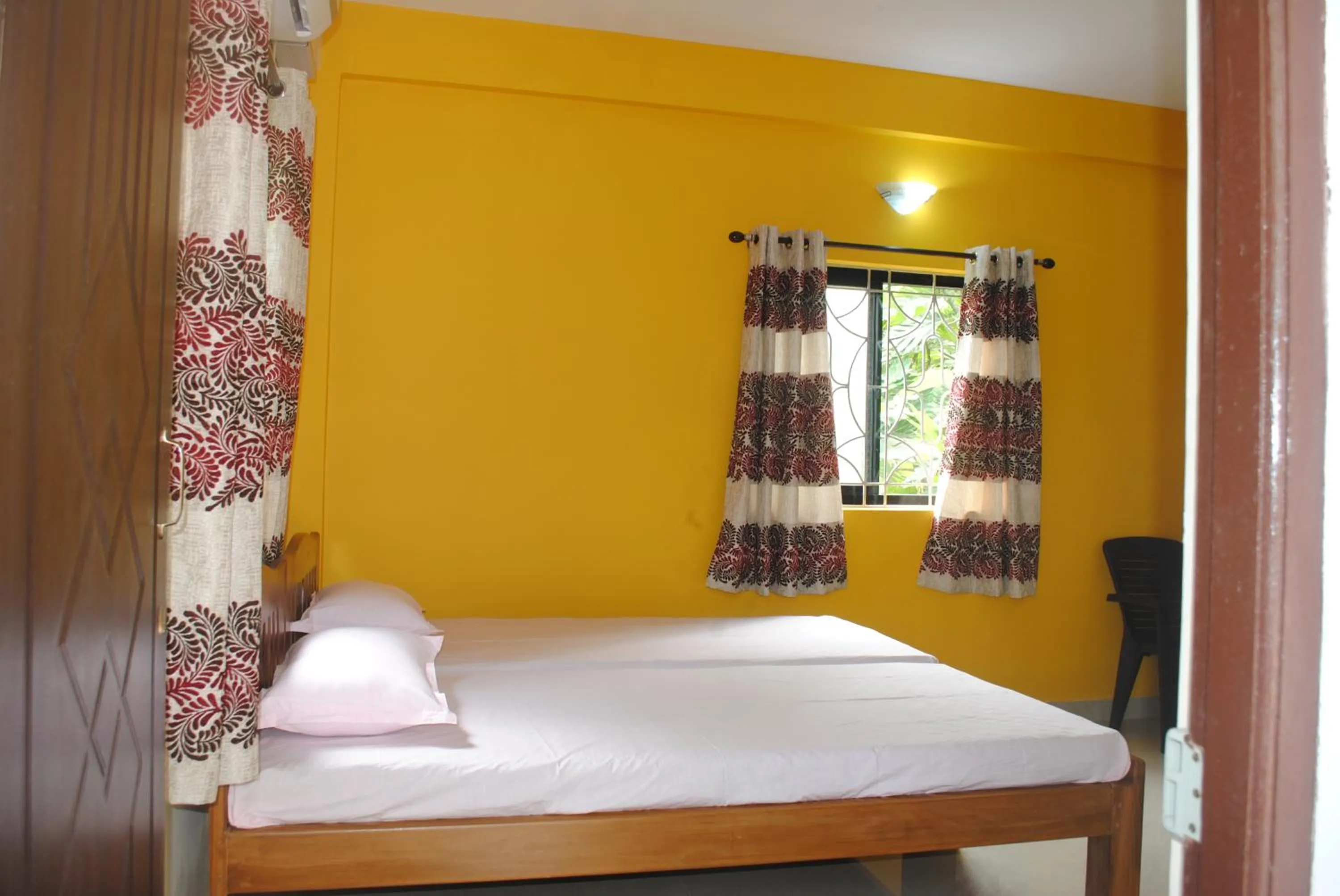 Bed in Joe And Marietta's Guesthouse