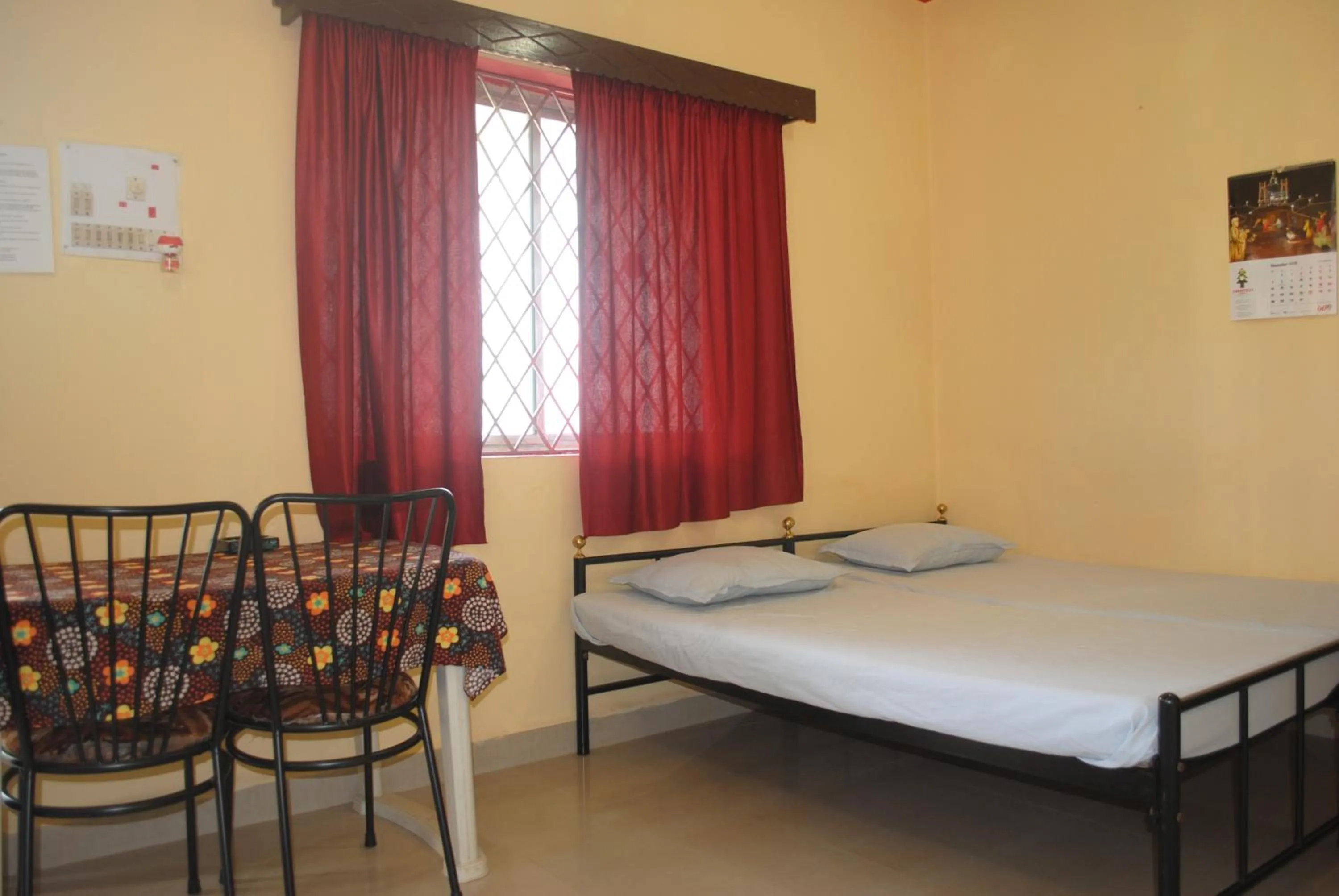 Bed in Joe And Marietta's Guesthouse