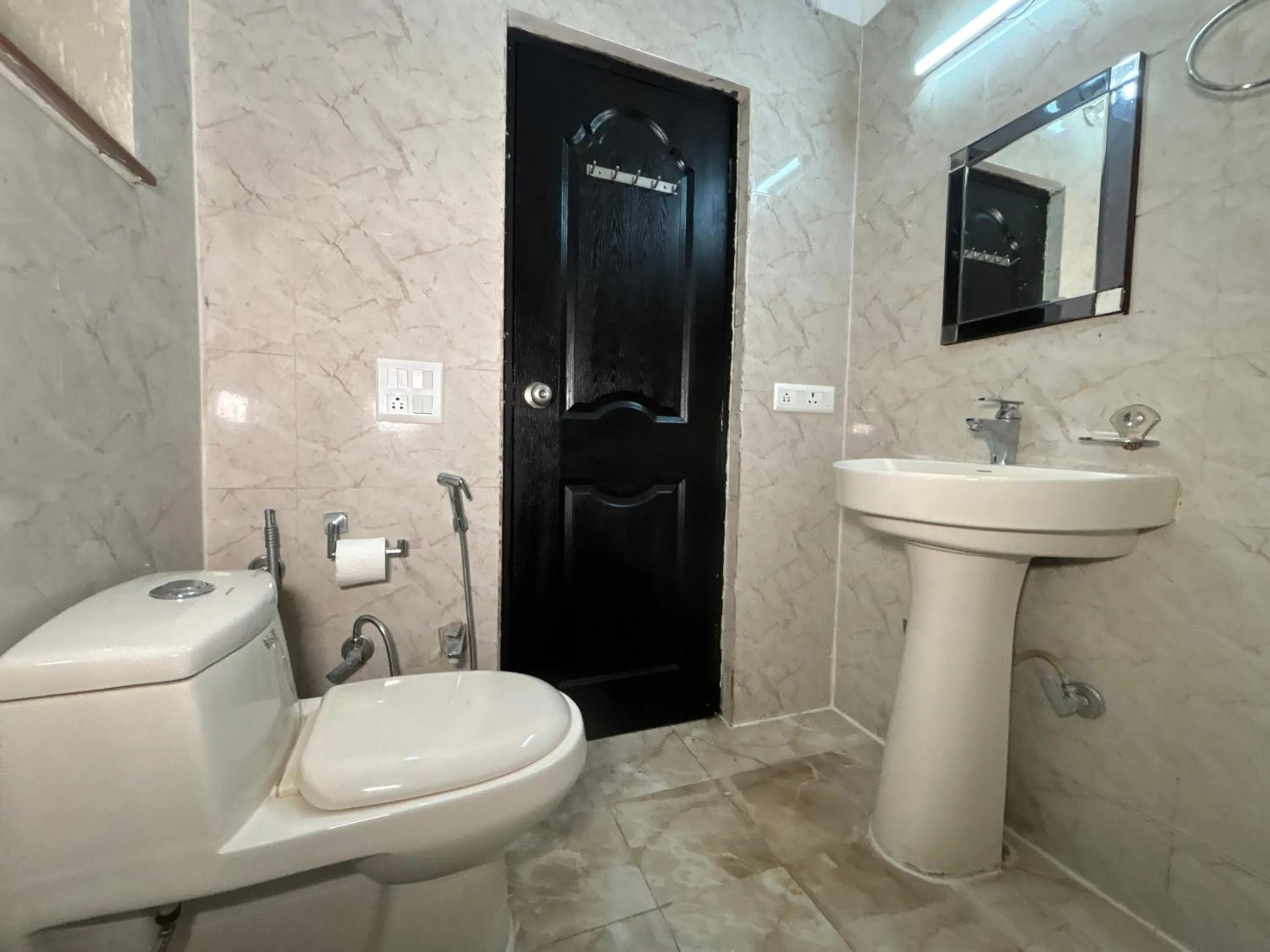 Shower in Vedas Tapovan