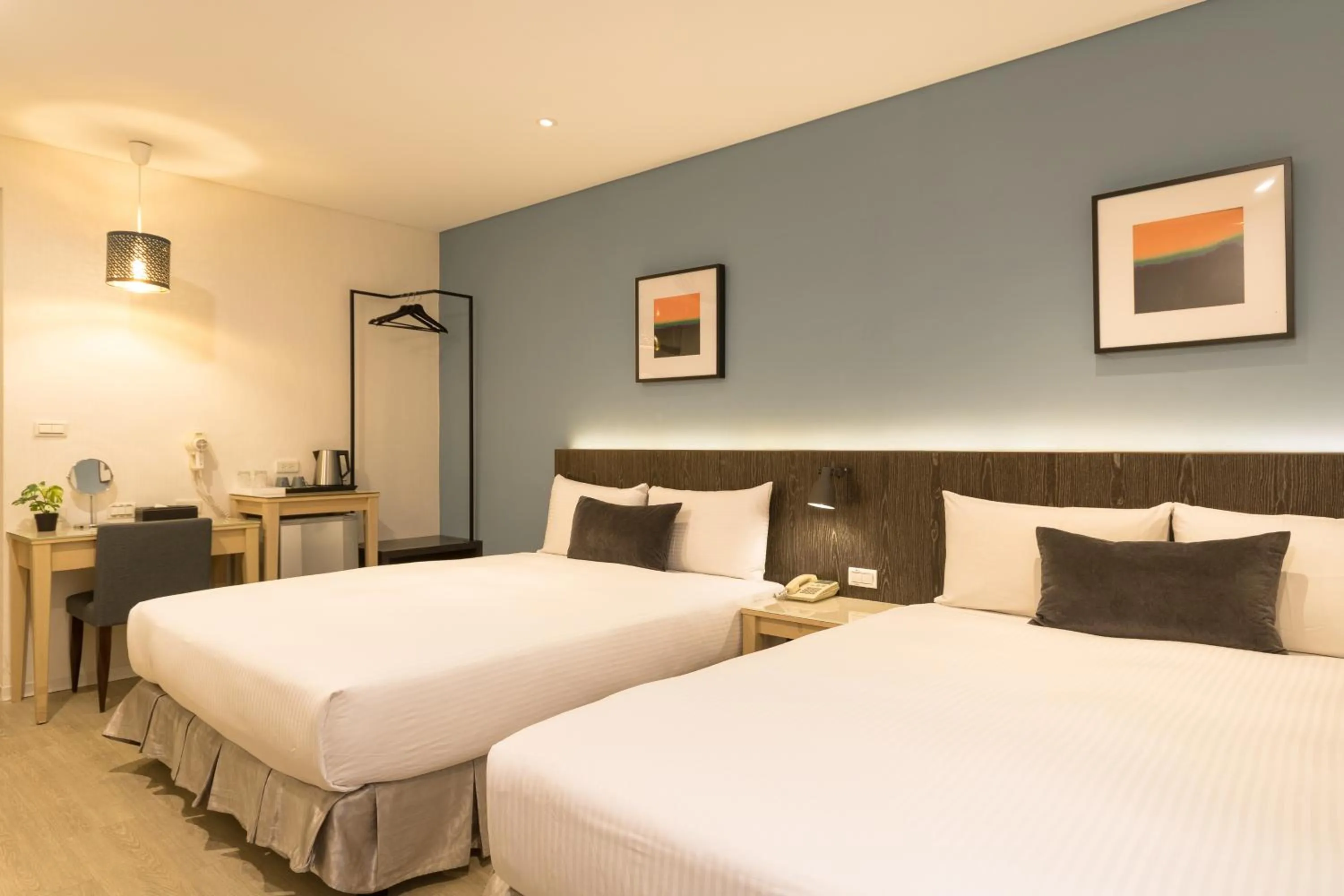 Bed in Just Enjoy Business Hotel