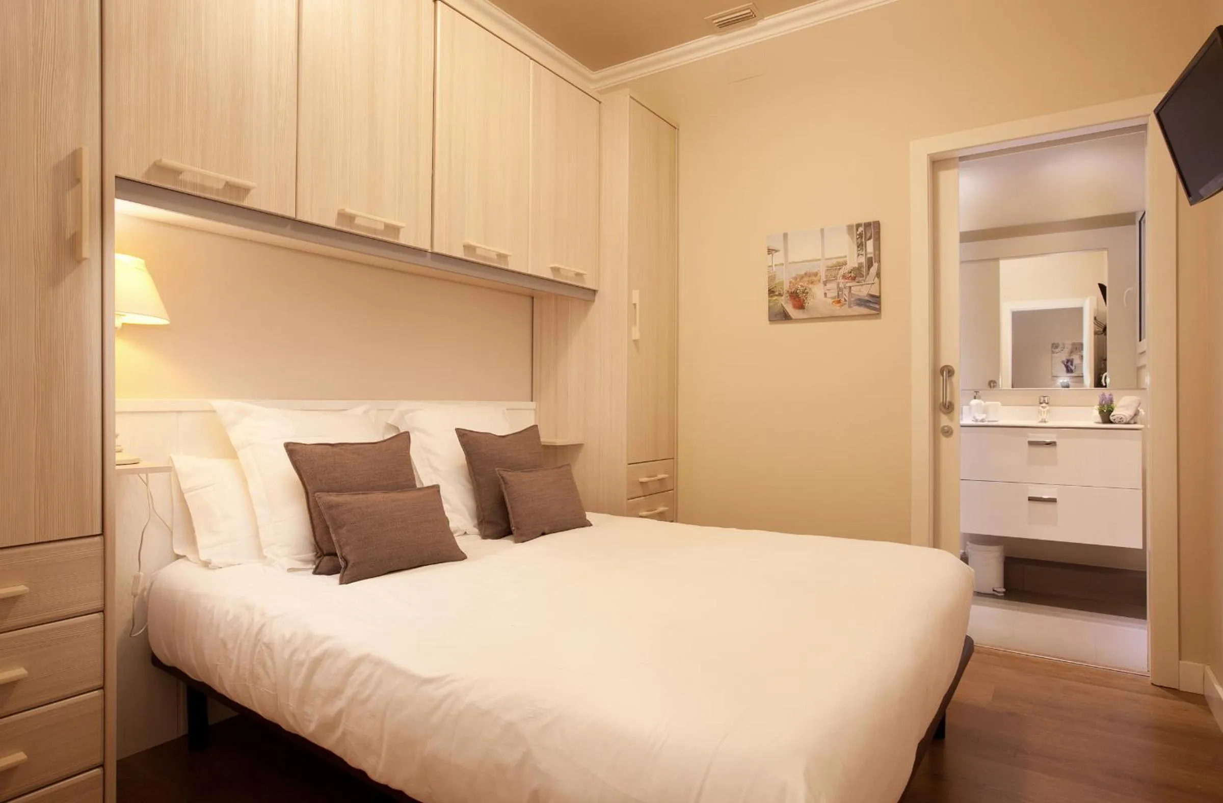 Bed in Enjoybcn Coliseum Apartments