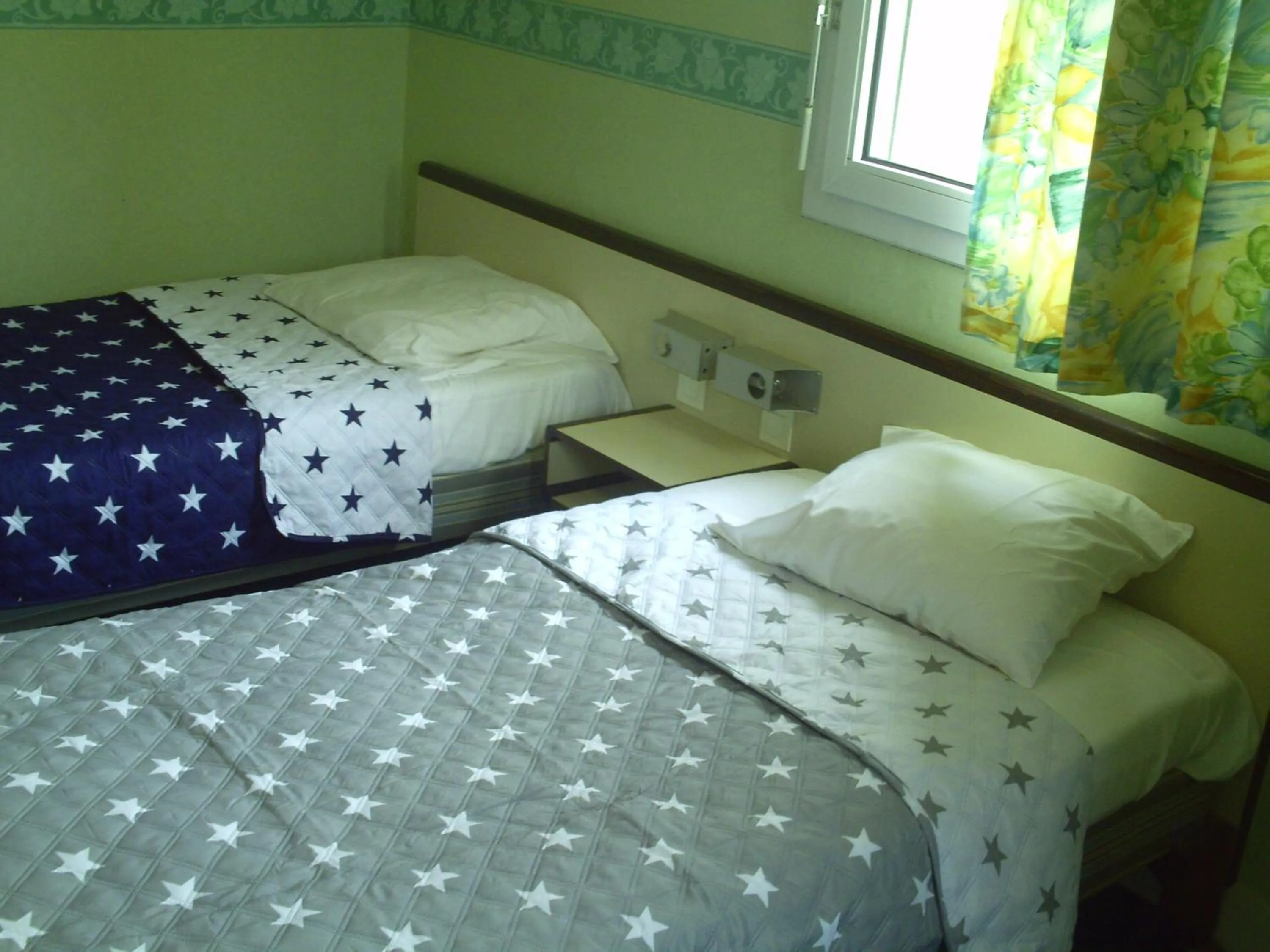 Bed in Hôtel l'Eden