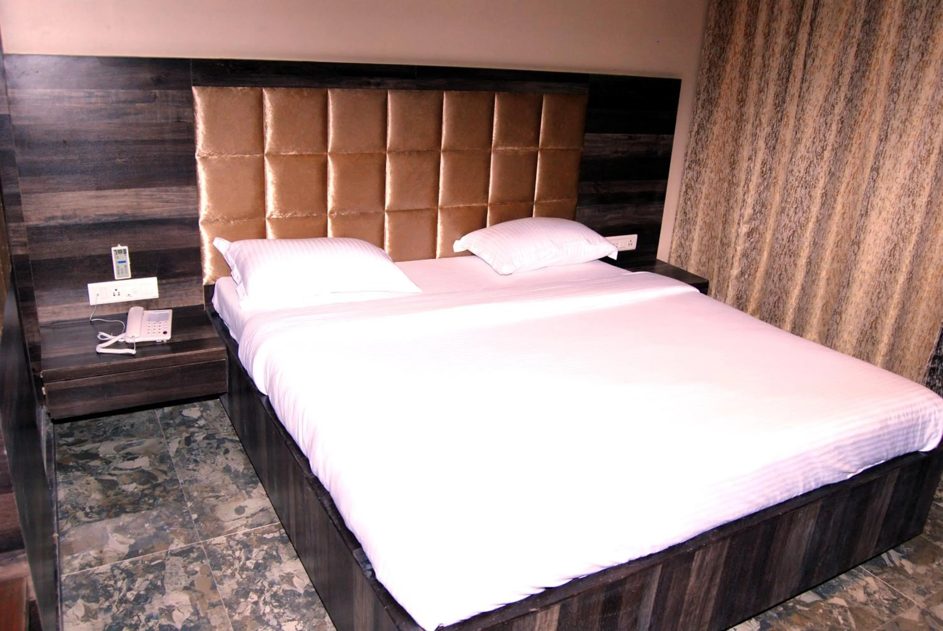 Bed in Hotel Apaar