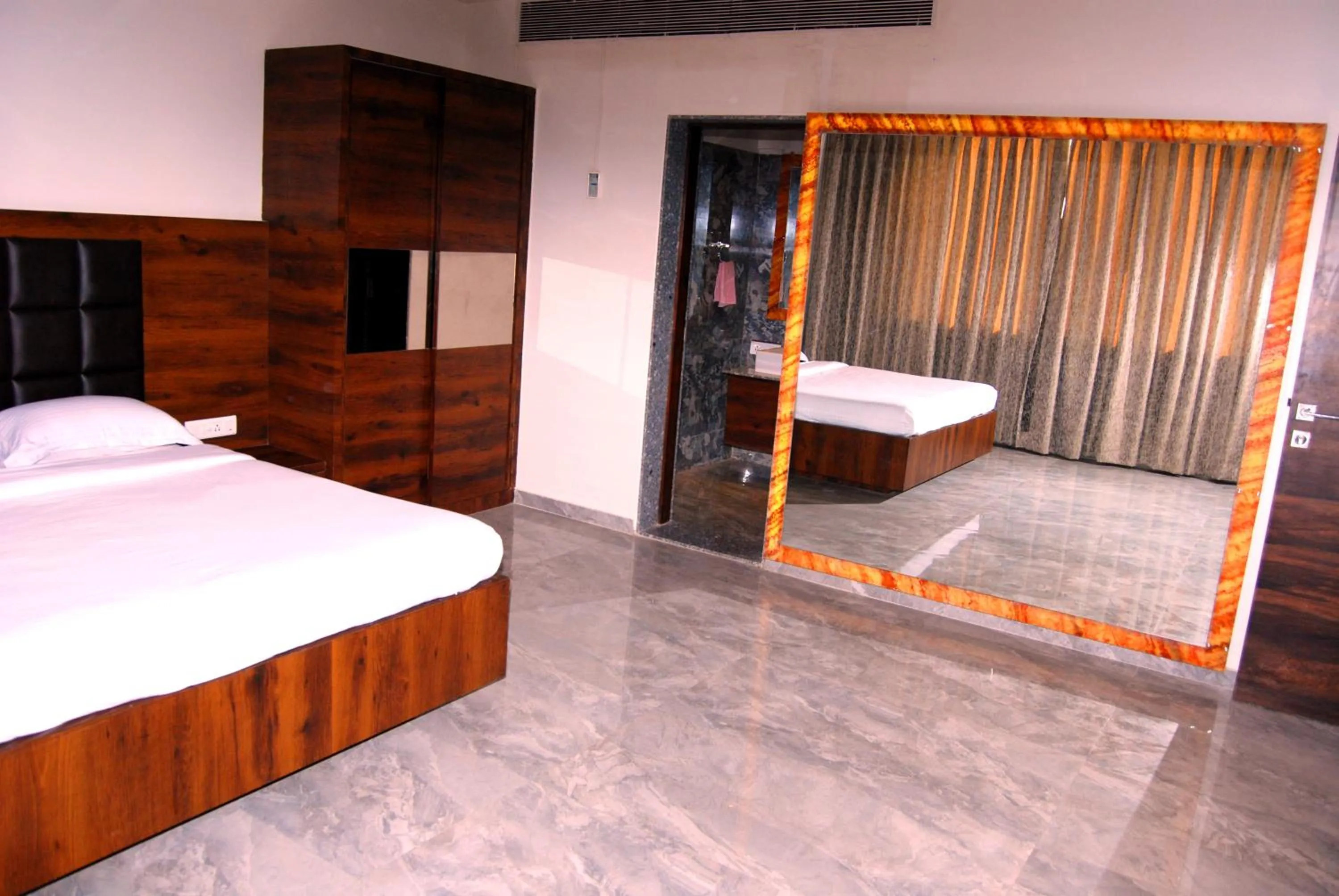 Photo of the whole room, Bed in Hotel Apaar