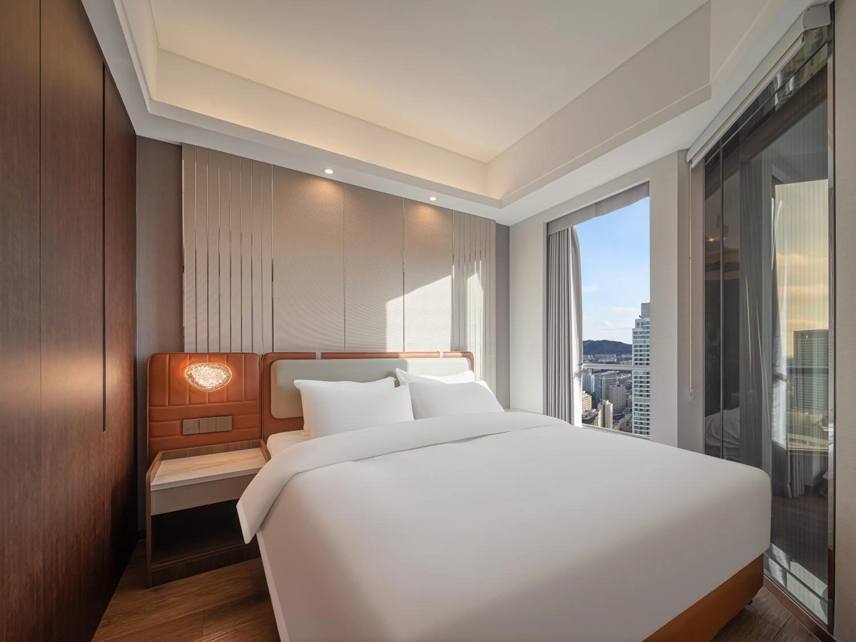 Bed in Dalian Zhongshan Square Seaview Meilun Hotel