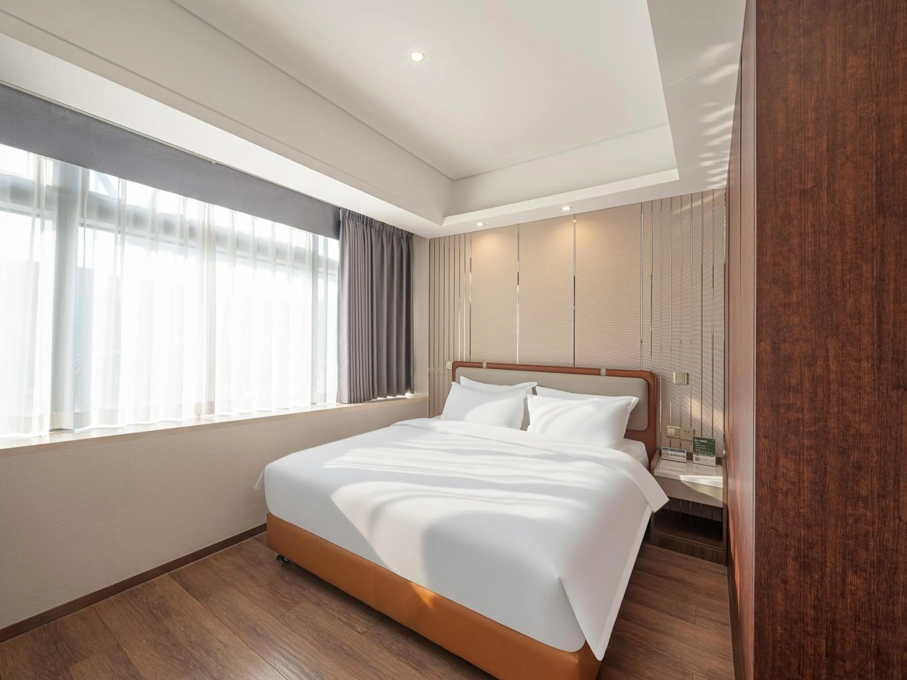 Bed in Dalian Zhongshan Square Seaview Meilun Hotel