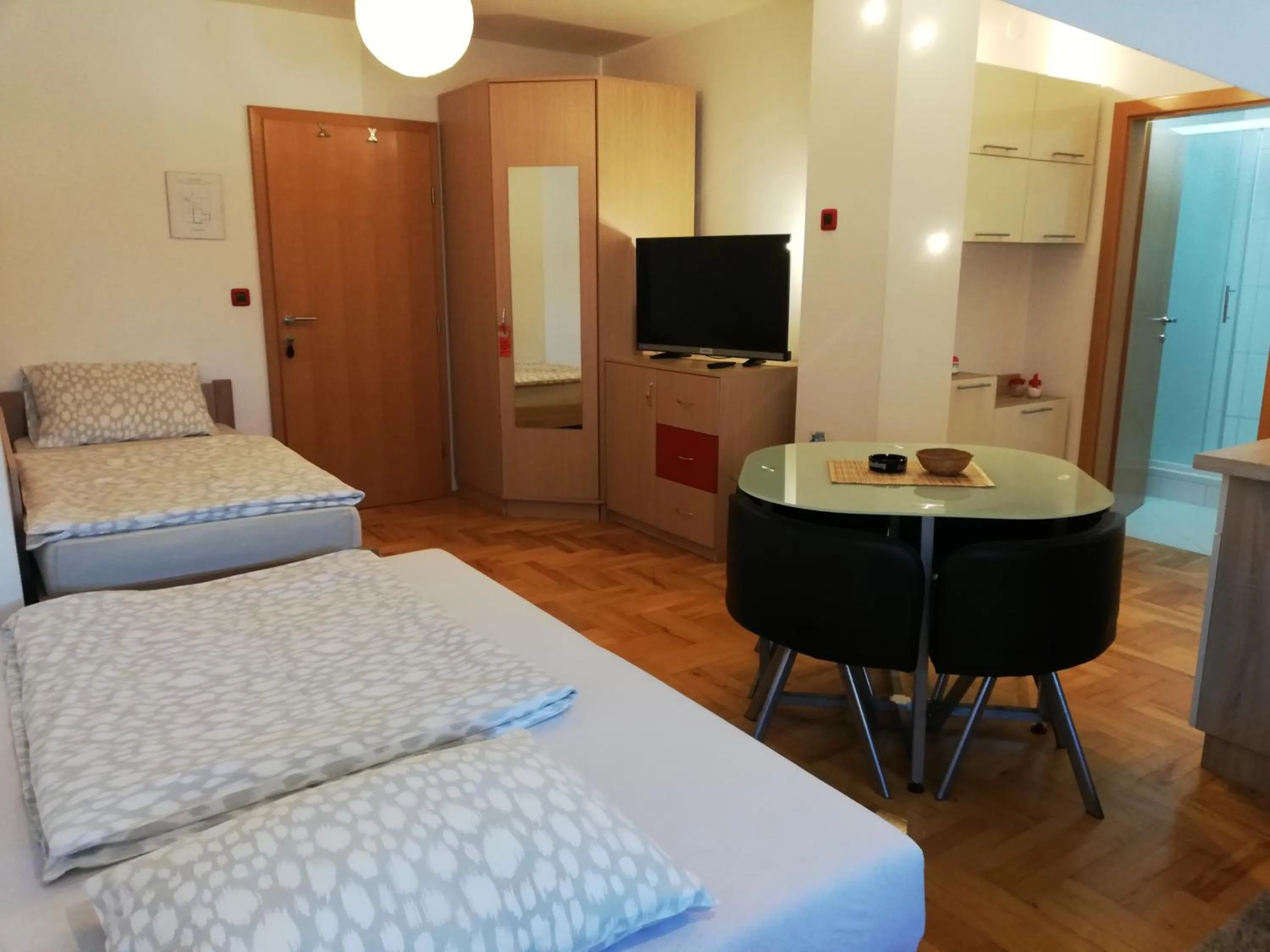 Bed in Studio Apartments Korosteljev