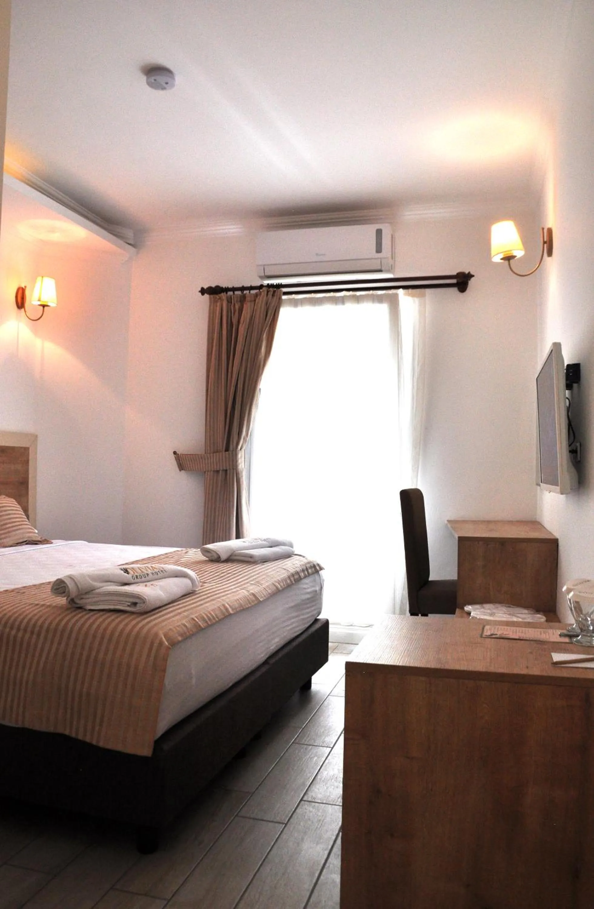 Bed in Olivias Group Hotel