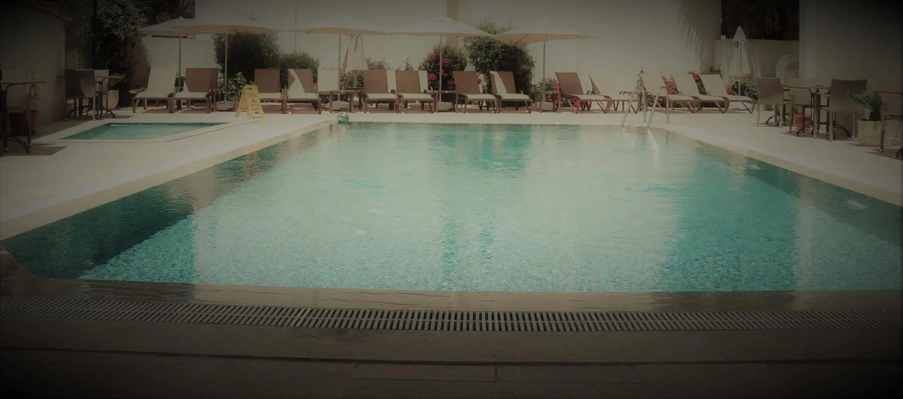 Swimming pool in Olivias Group Hotel